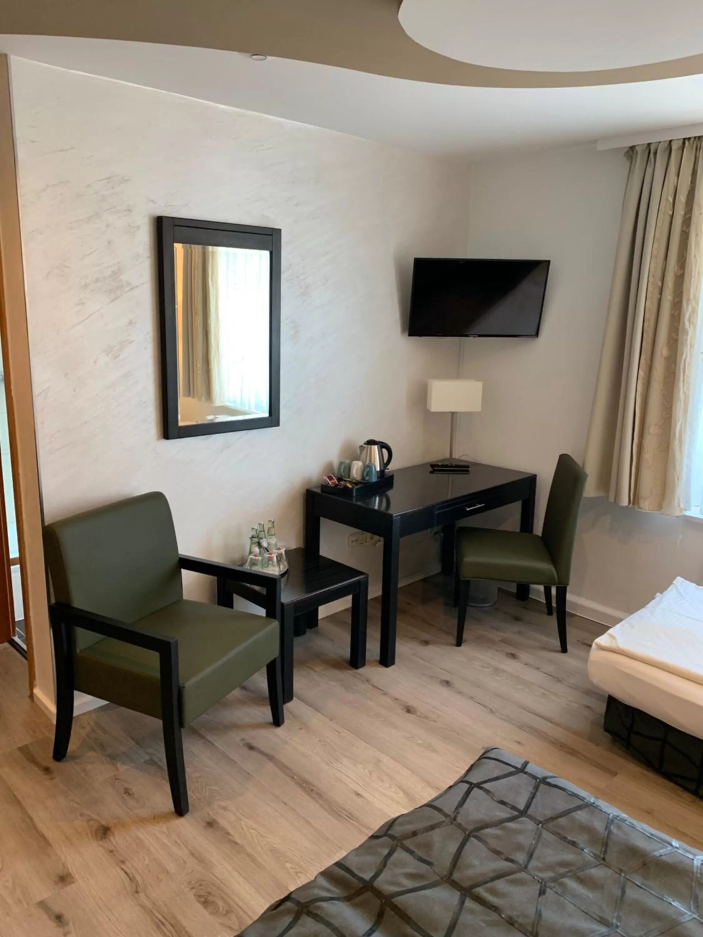 Seating area, Bed in Boutique Hotel Goldene Henne