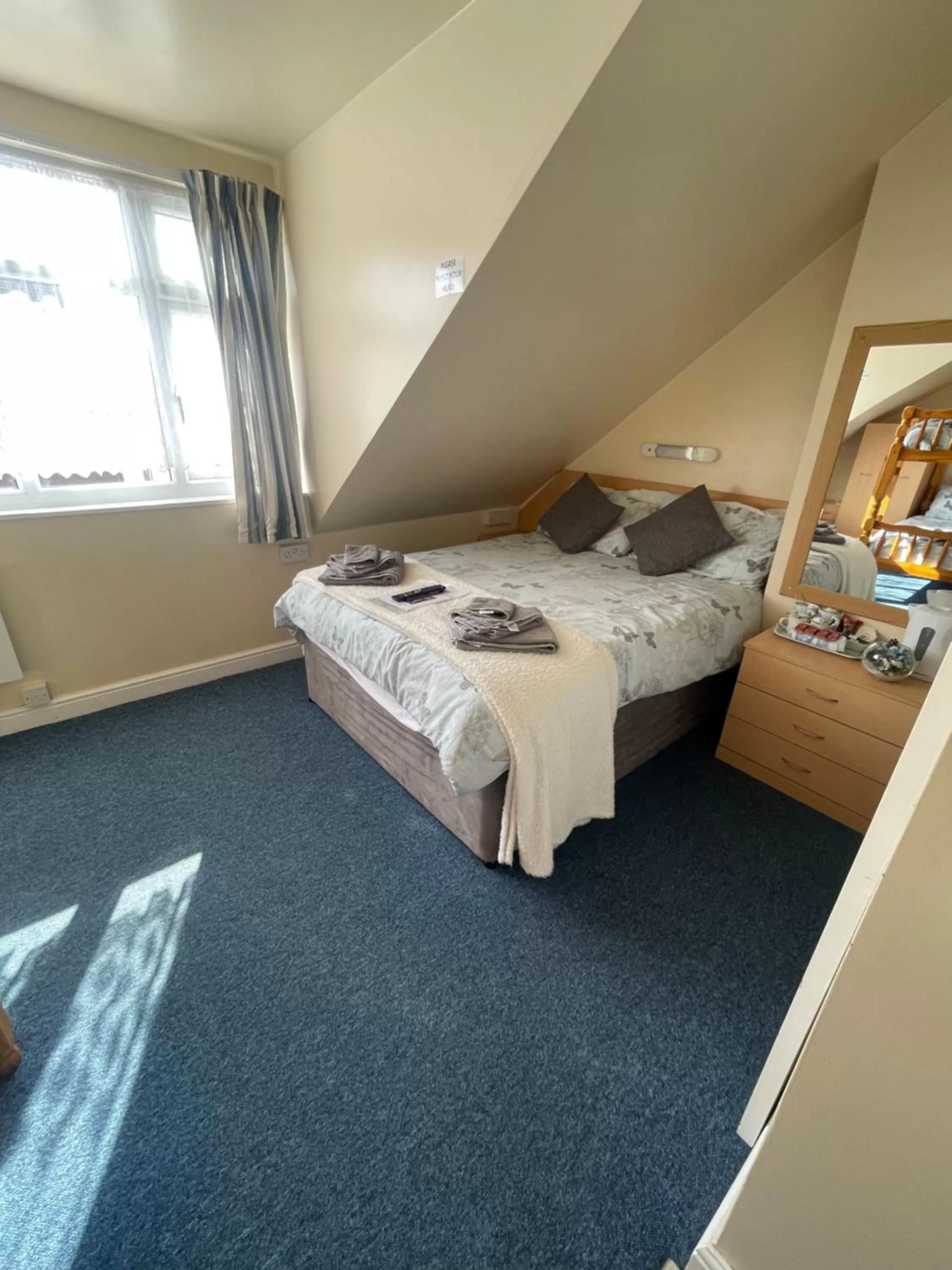 Bed in Ivydene Guest House