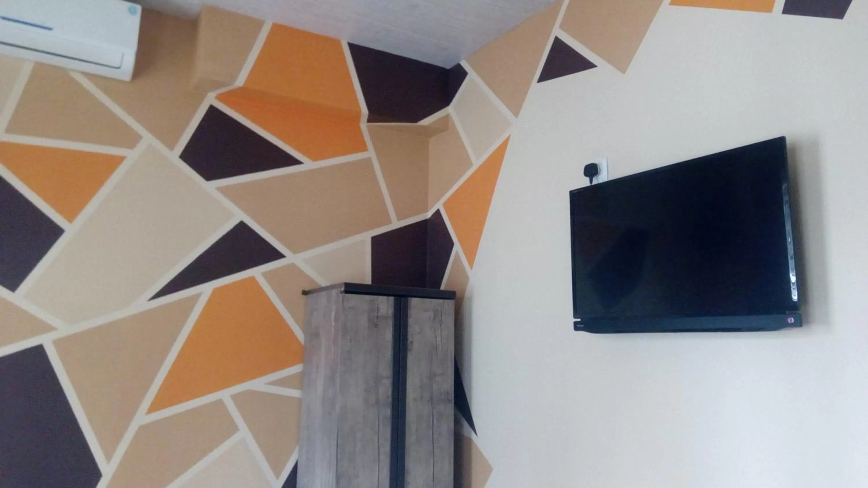 TV and multimedia, TV/Entertainment Center in Hotel Isani