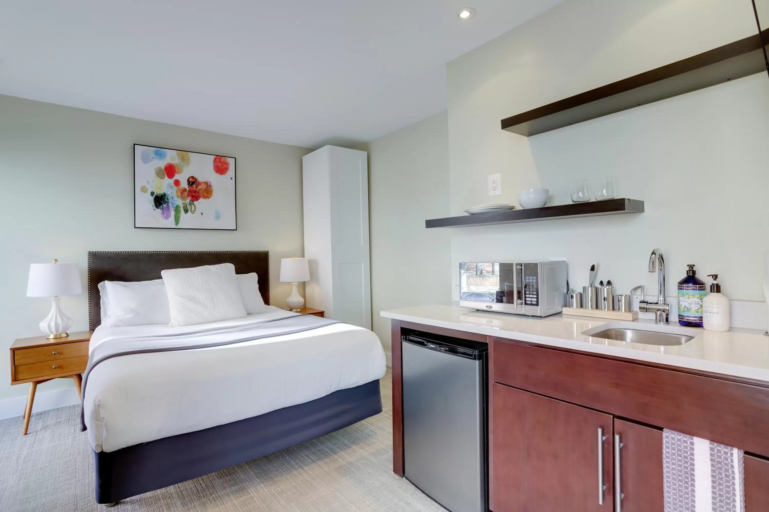 Bed in Sojourn at DuPont Place