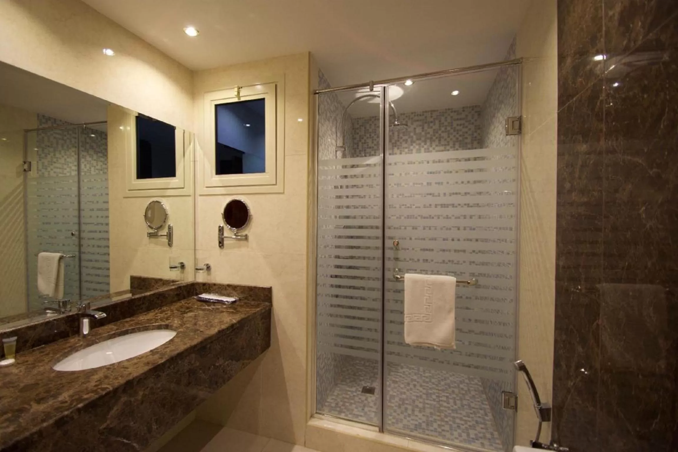 On site, Bathroom in Abat Suites