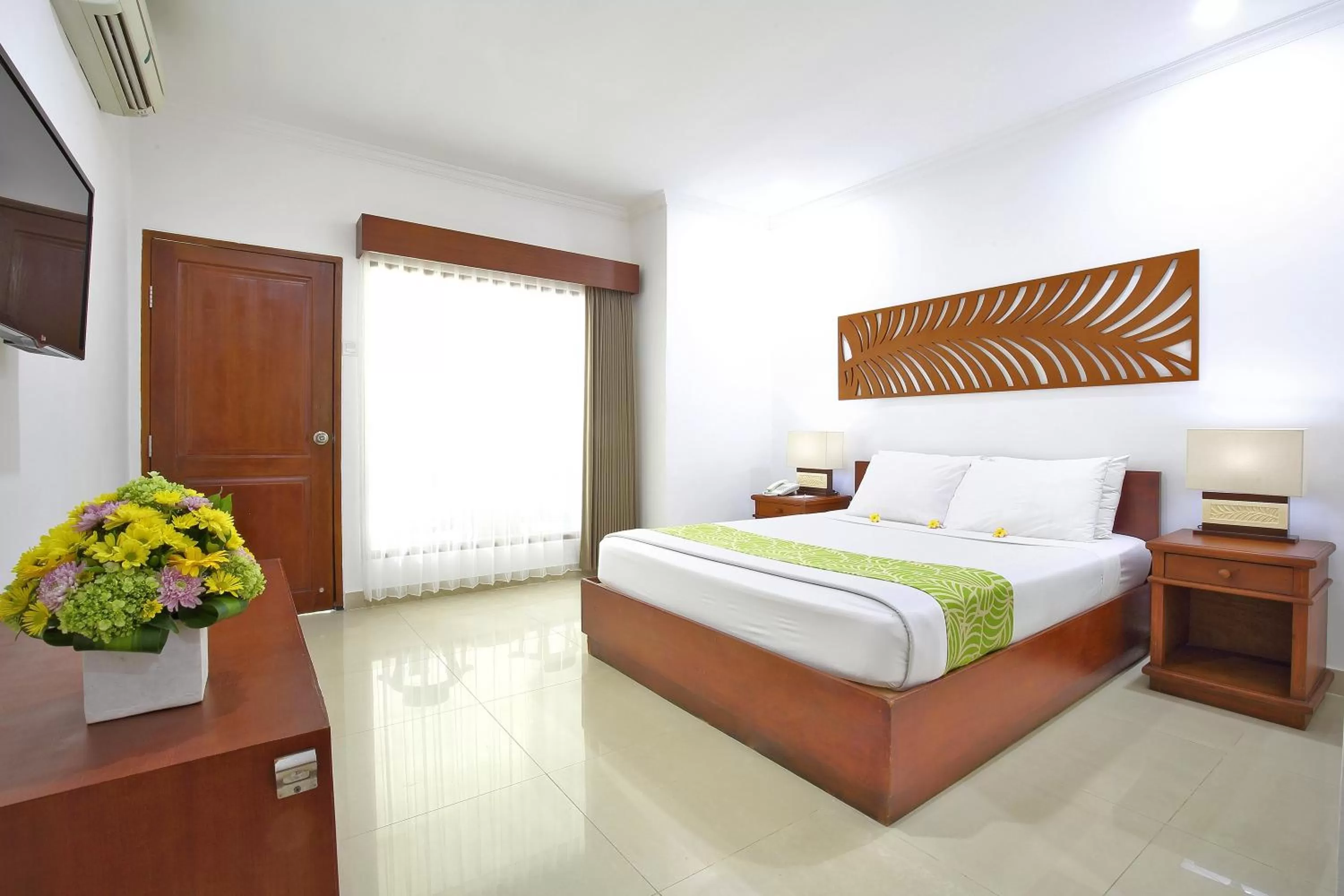Photo of the whole room, Bed in Dewi Sri Hotel