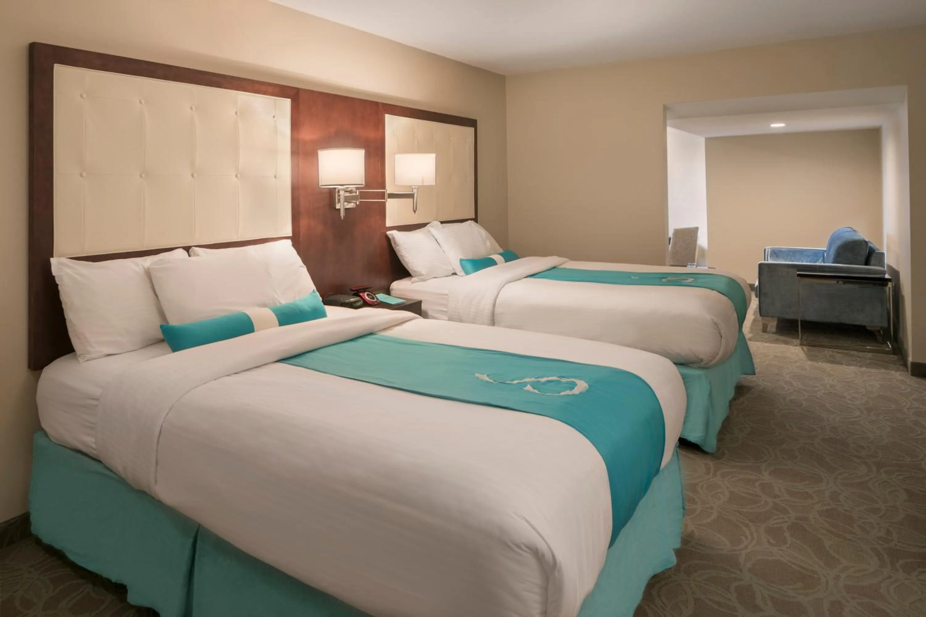 Bed in Aqua Blue Hotel