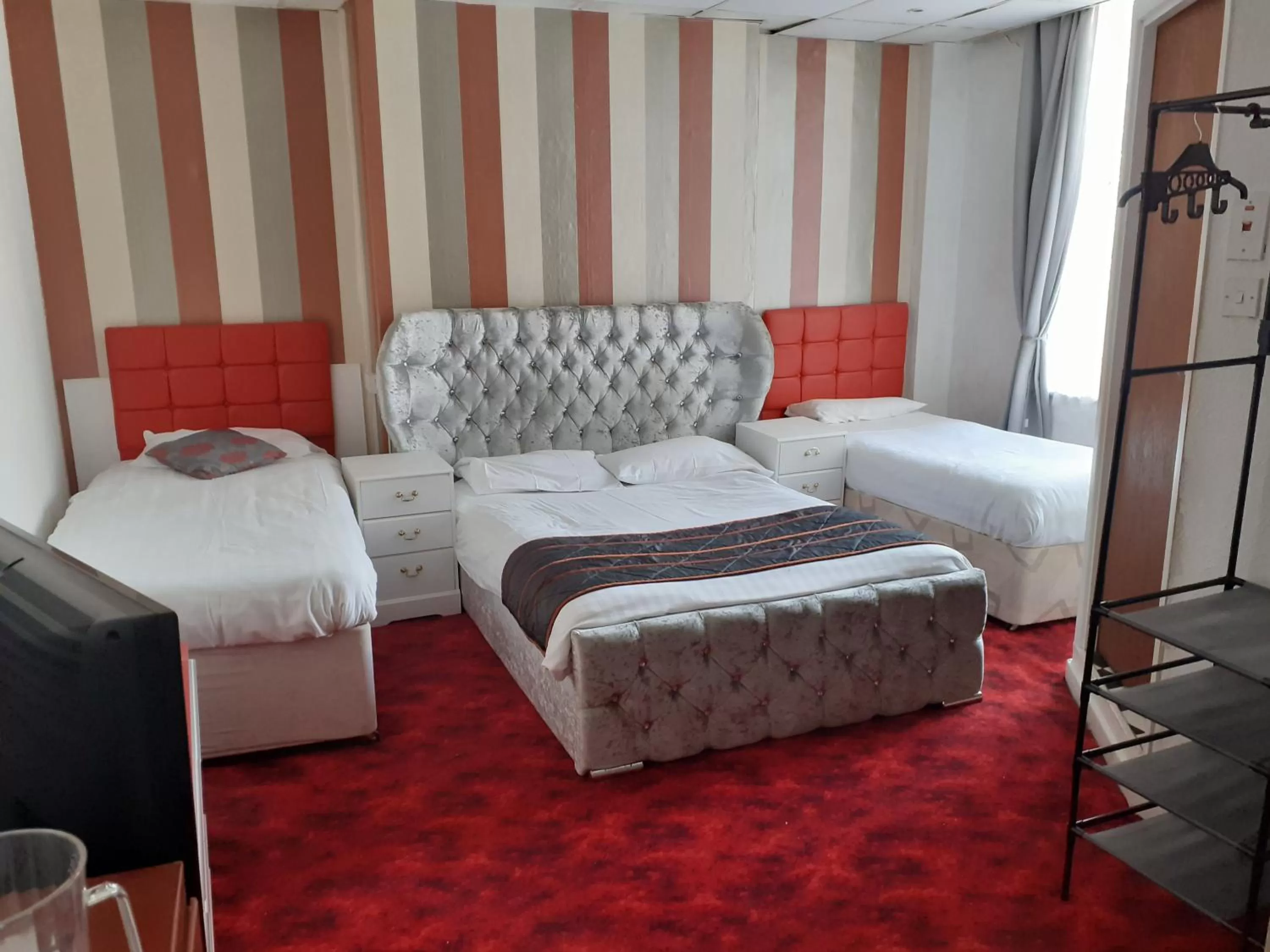 Bed in The Coastal Bay Hotel