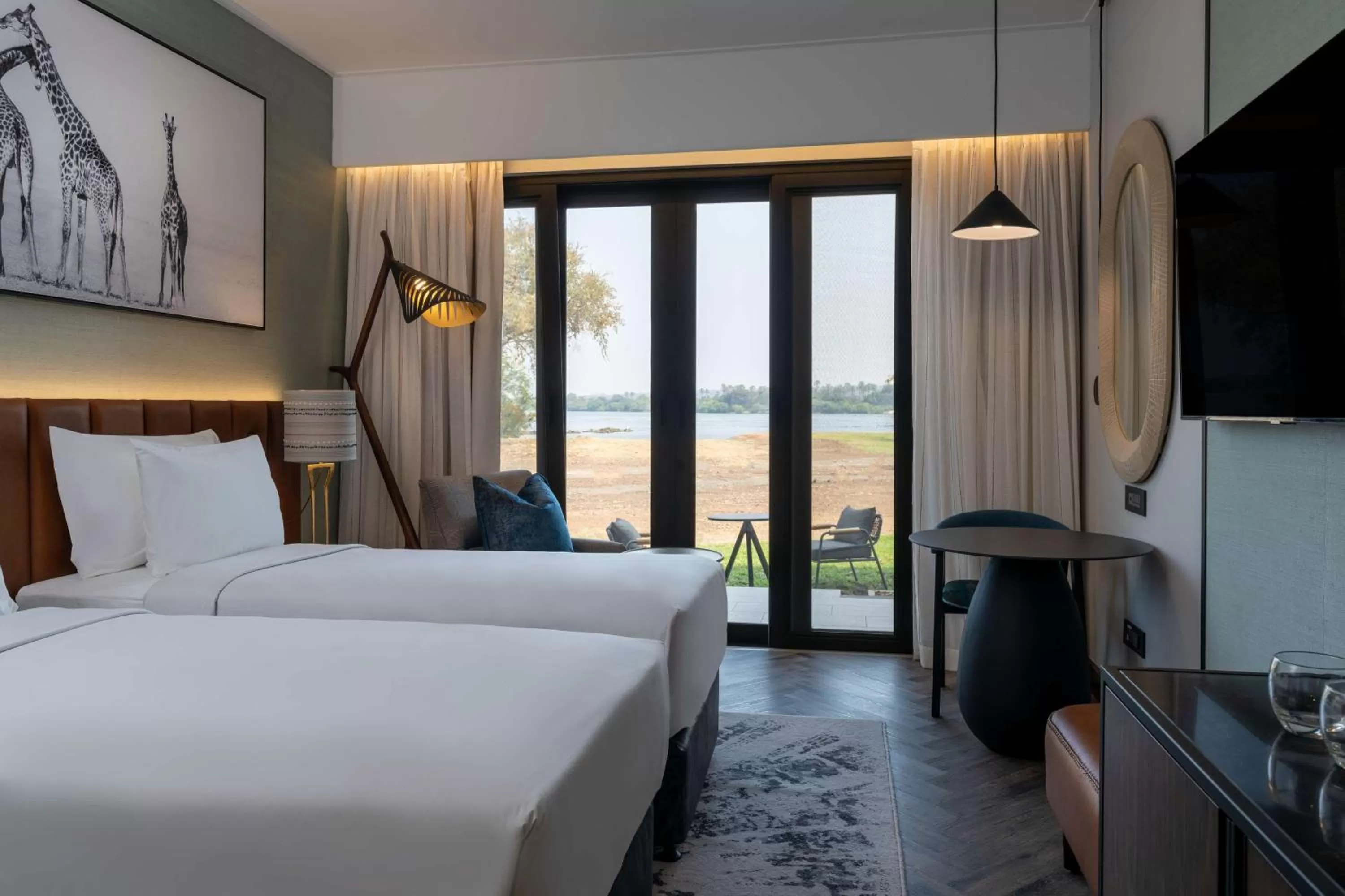 Photo of the whole room, Bed in Radisson Blu Mosi-oa-Tunya Livingstone Resort