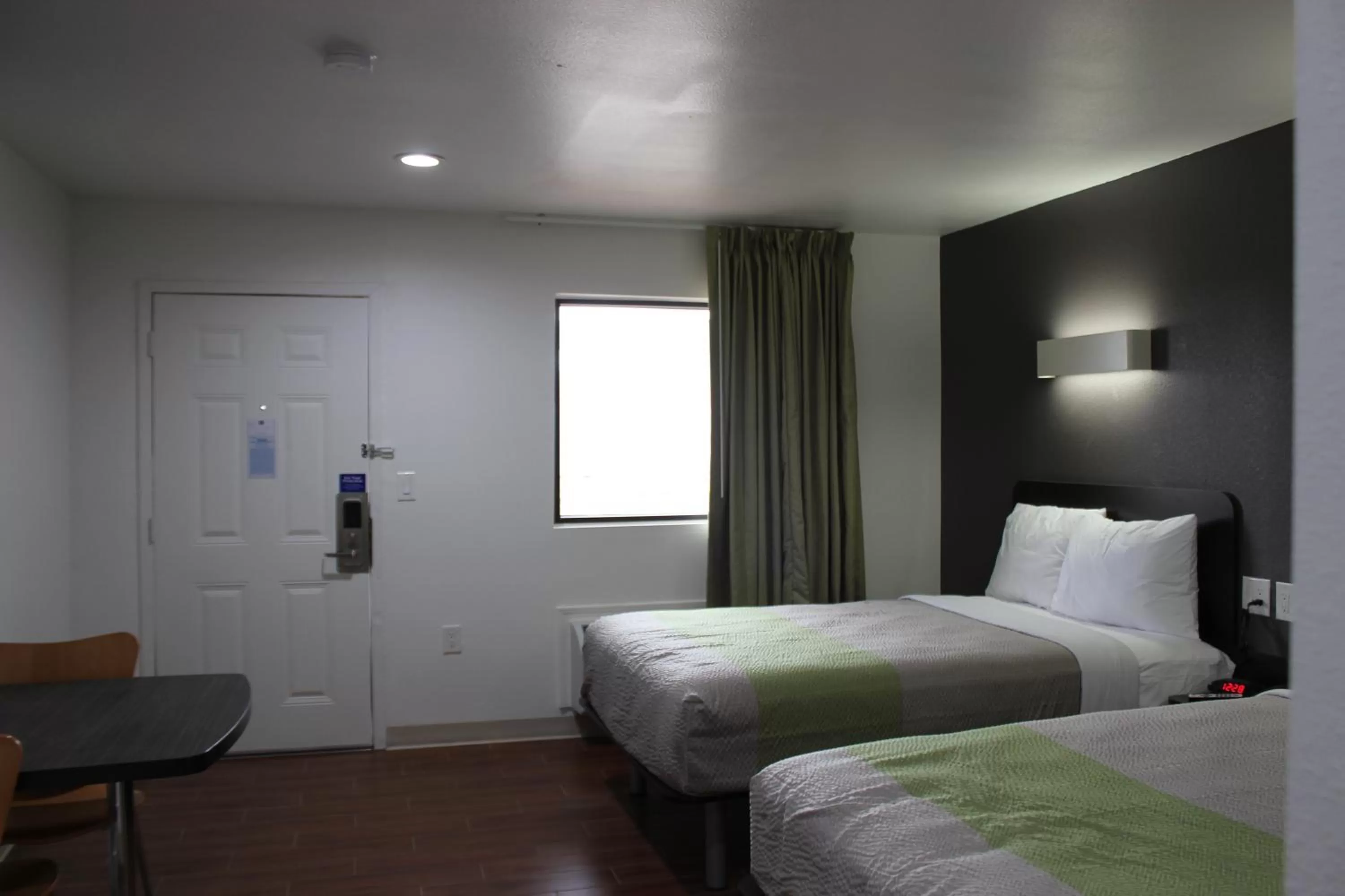 Bedroom, Bed in Studio 6-Houston, TX - East