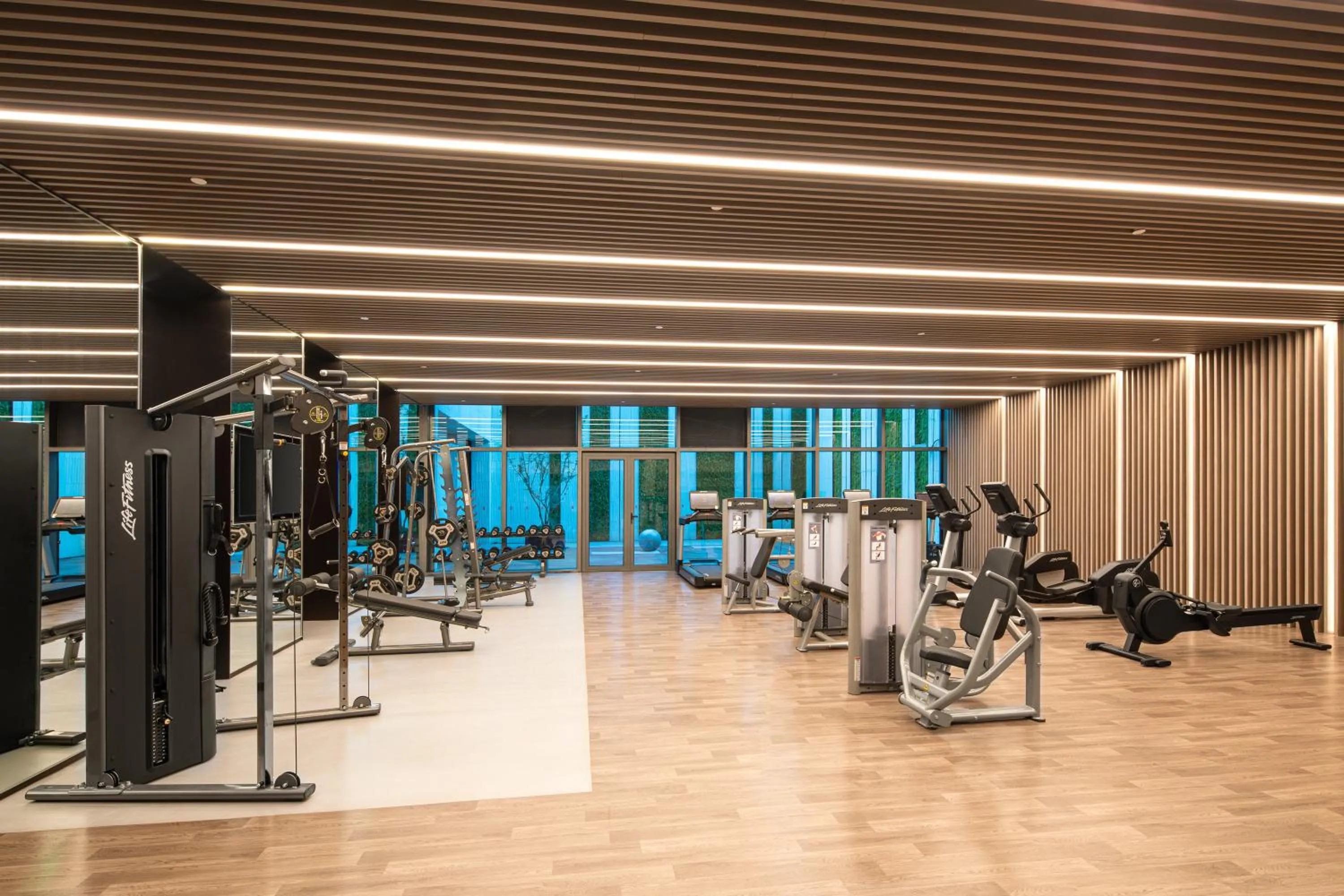 Fitness centre/facilities in HUALUXE Shanghai Changfeng Park - Park Lake View
