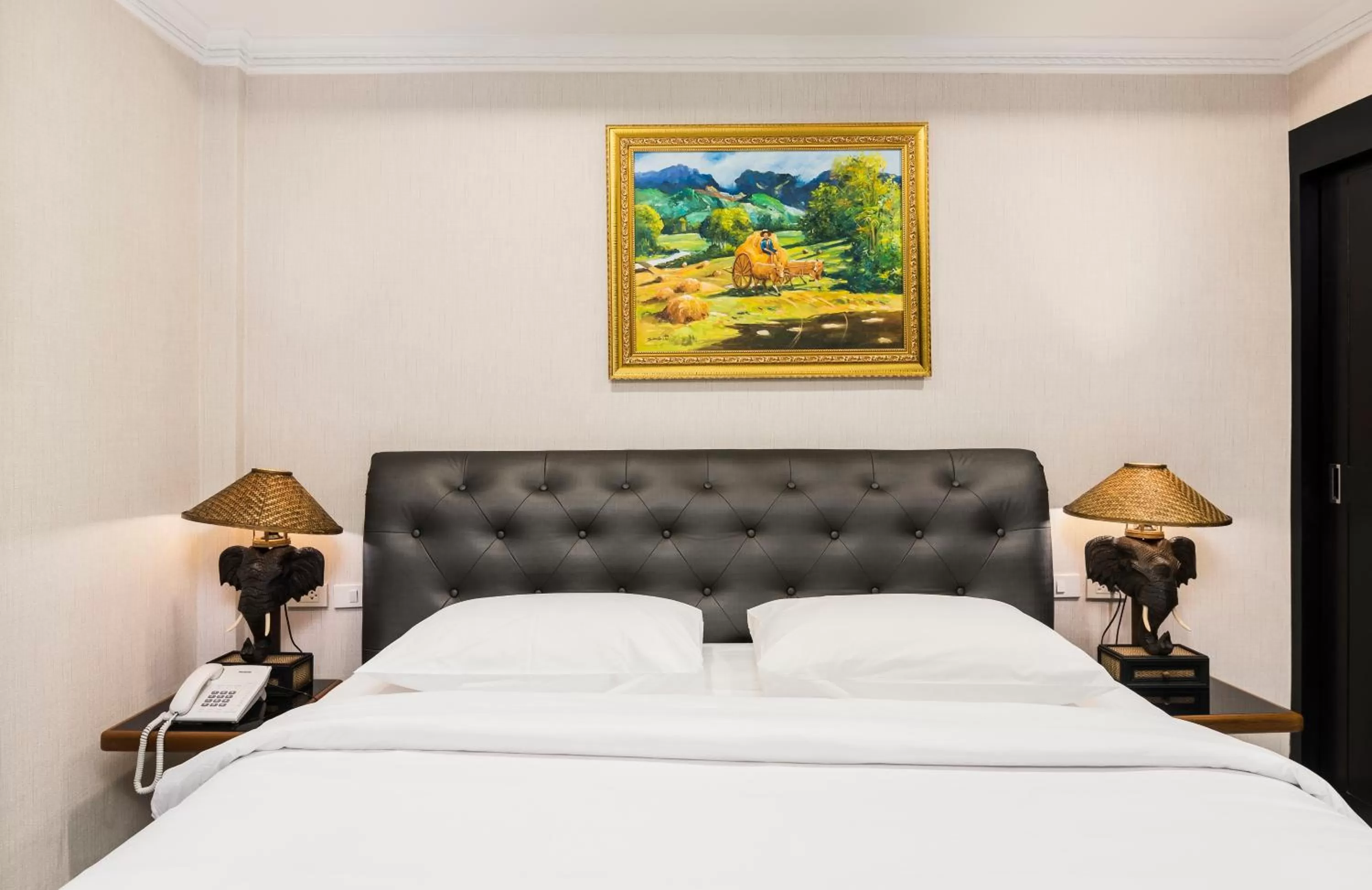 Bed in The Ambiance Hotel