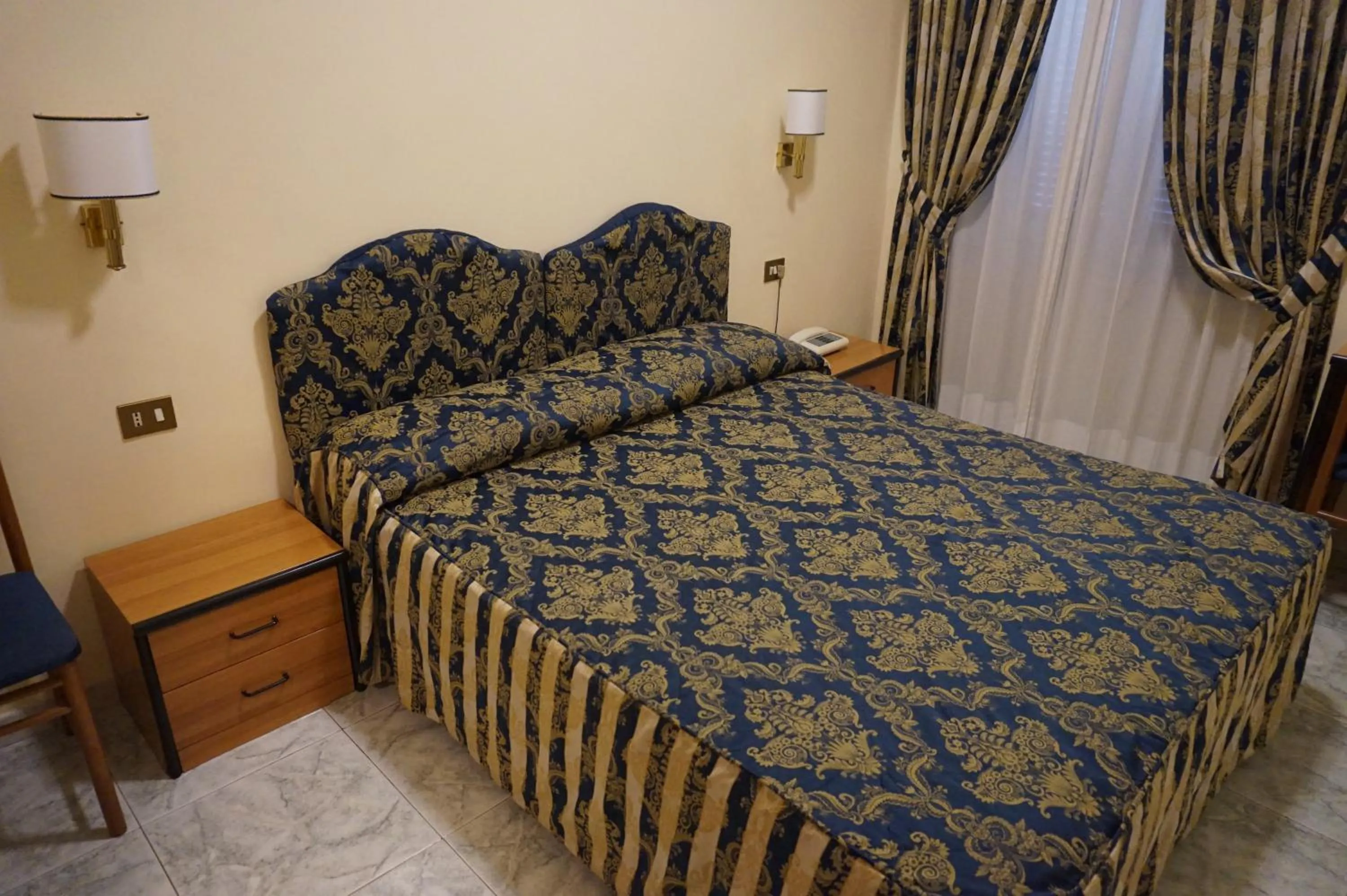 Bed in Hotel Mariano