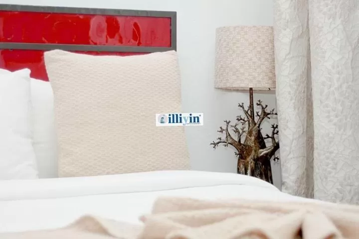 Bed in ILLIYIN Boutique Hotel