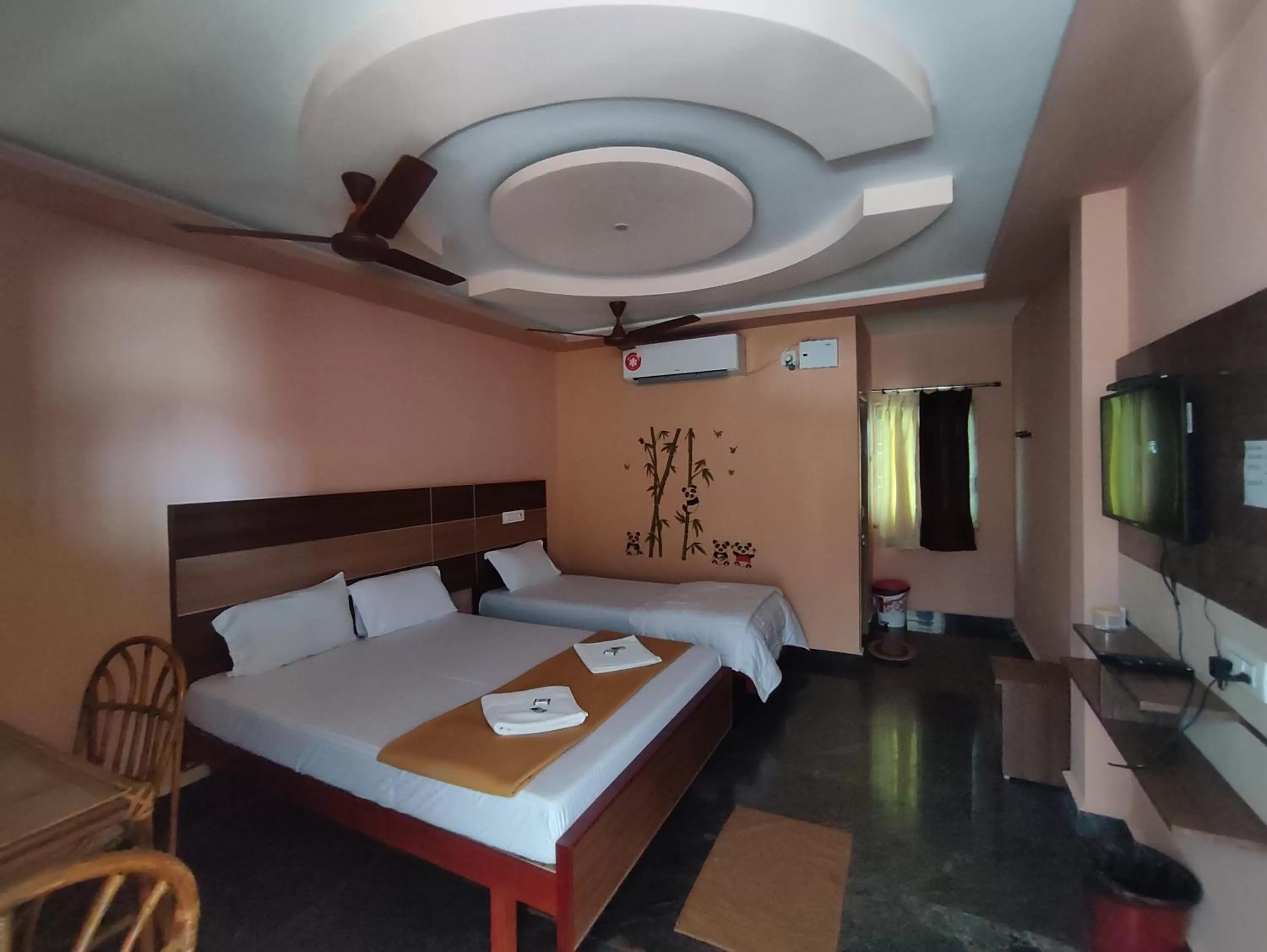 Bed in Sri Murugan Beach Paradise Hotel