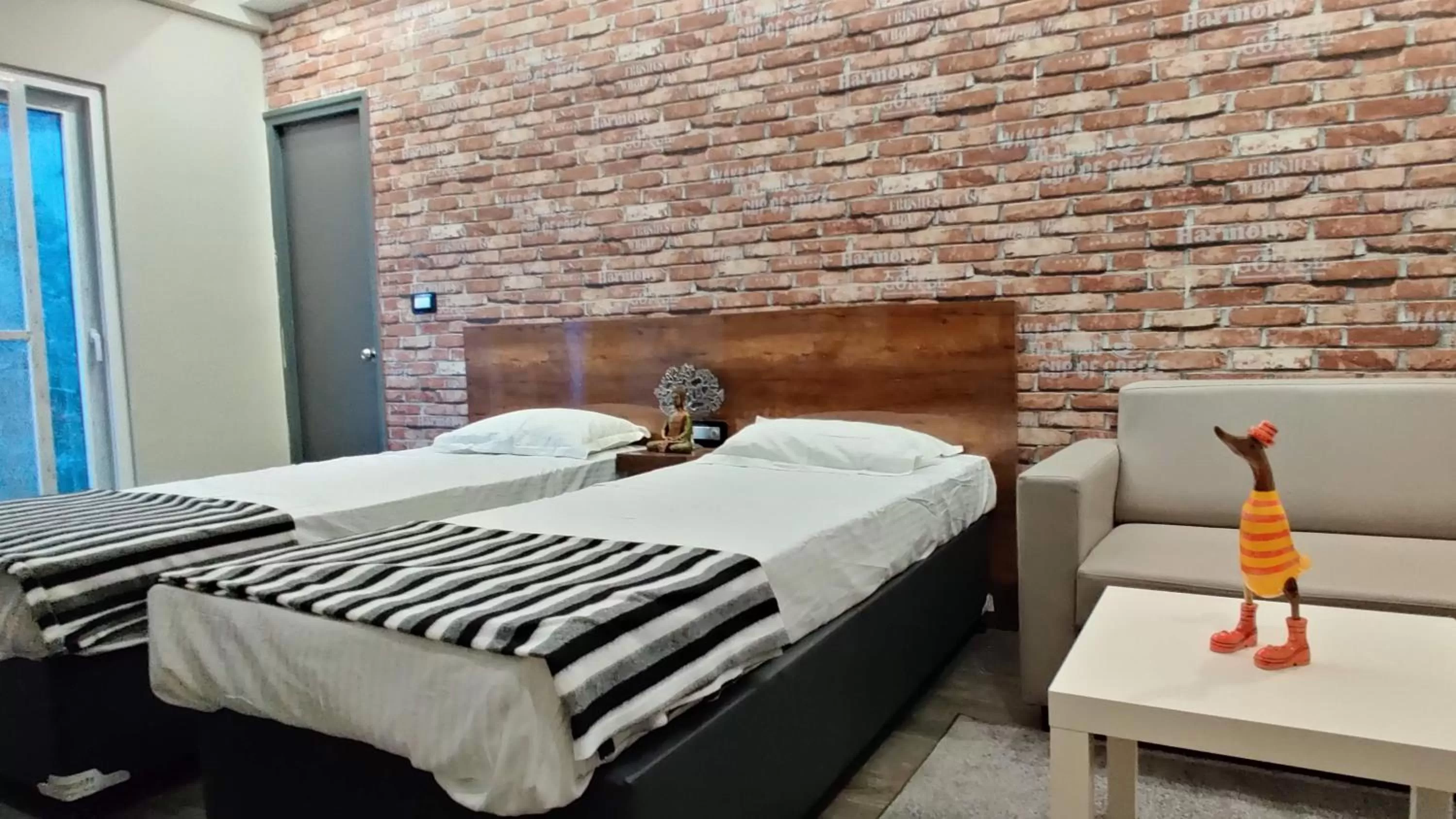 Bed in RESTEL STUDIO FLATS