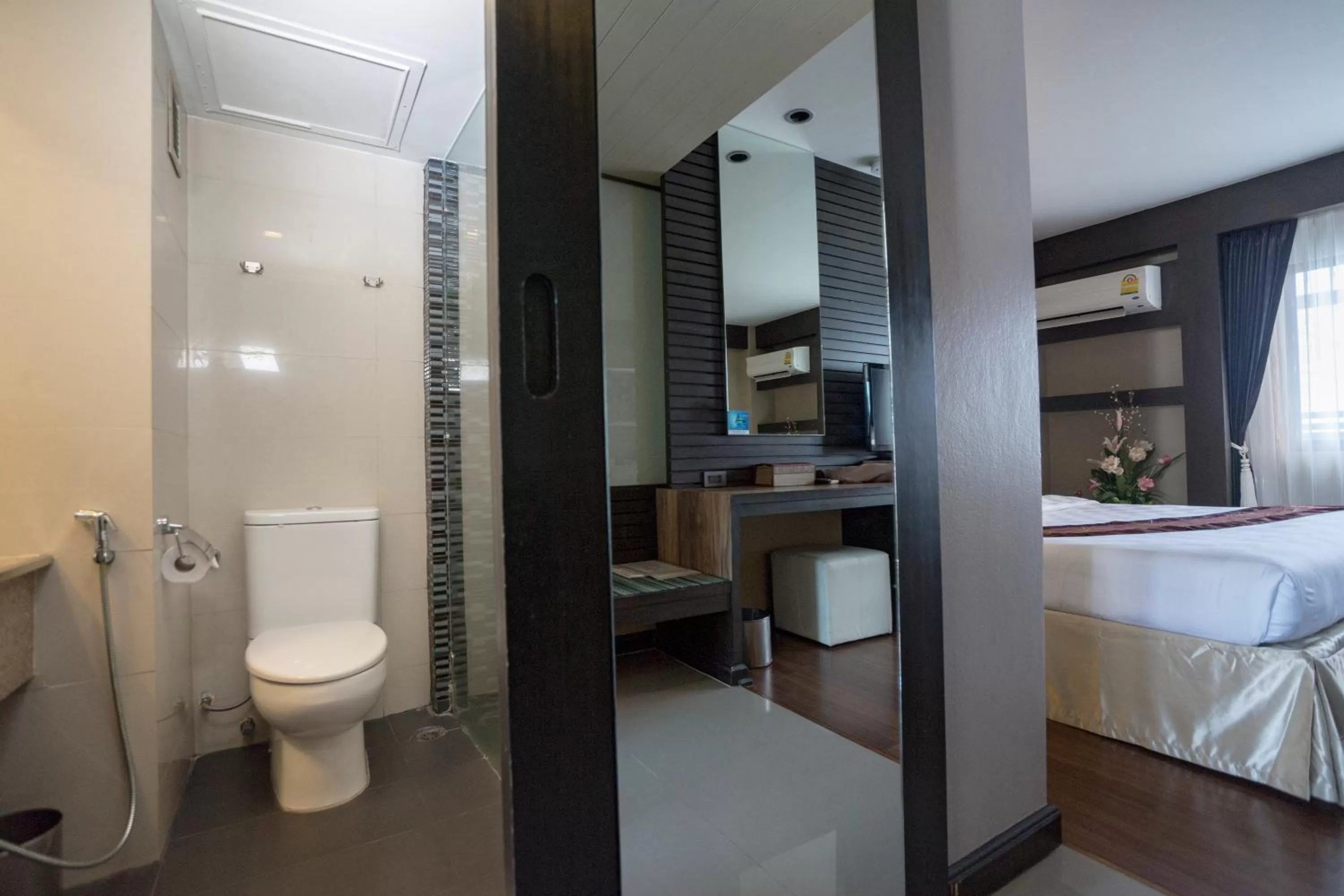 Bed in Kiss Gardenhome Chic Hotel