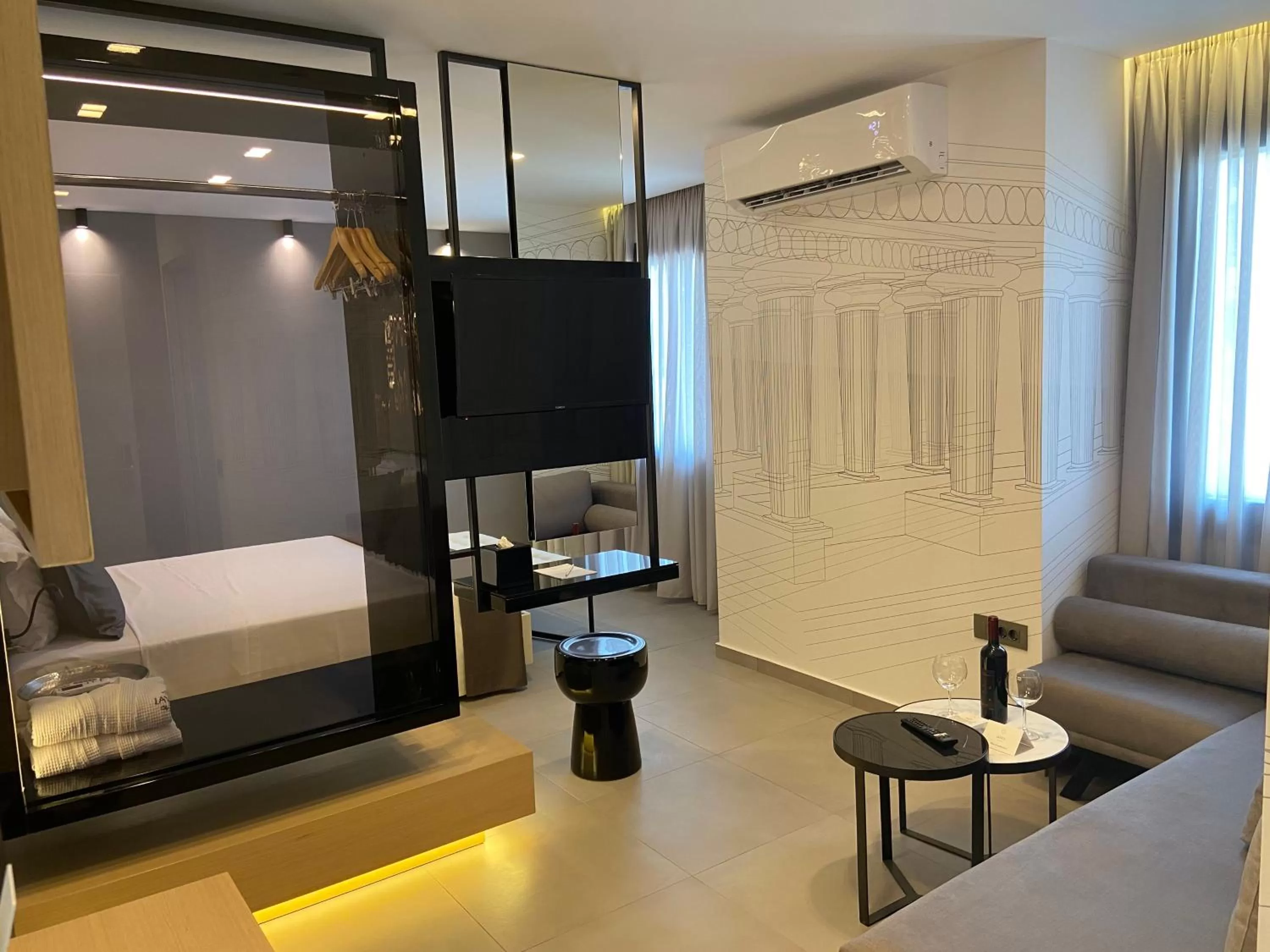 Living room, Bed in Lavris City Suites