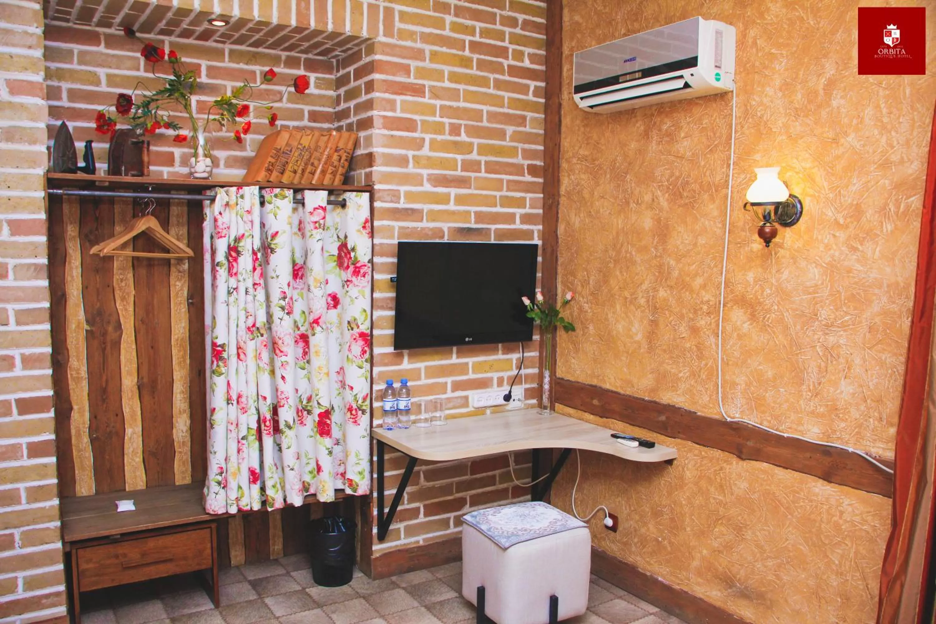 Communal lounge/ TV room in Orbita hotel Shymkent