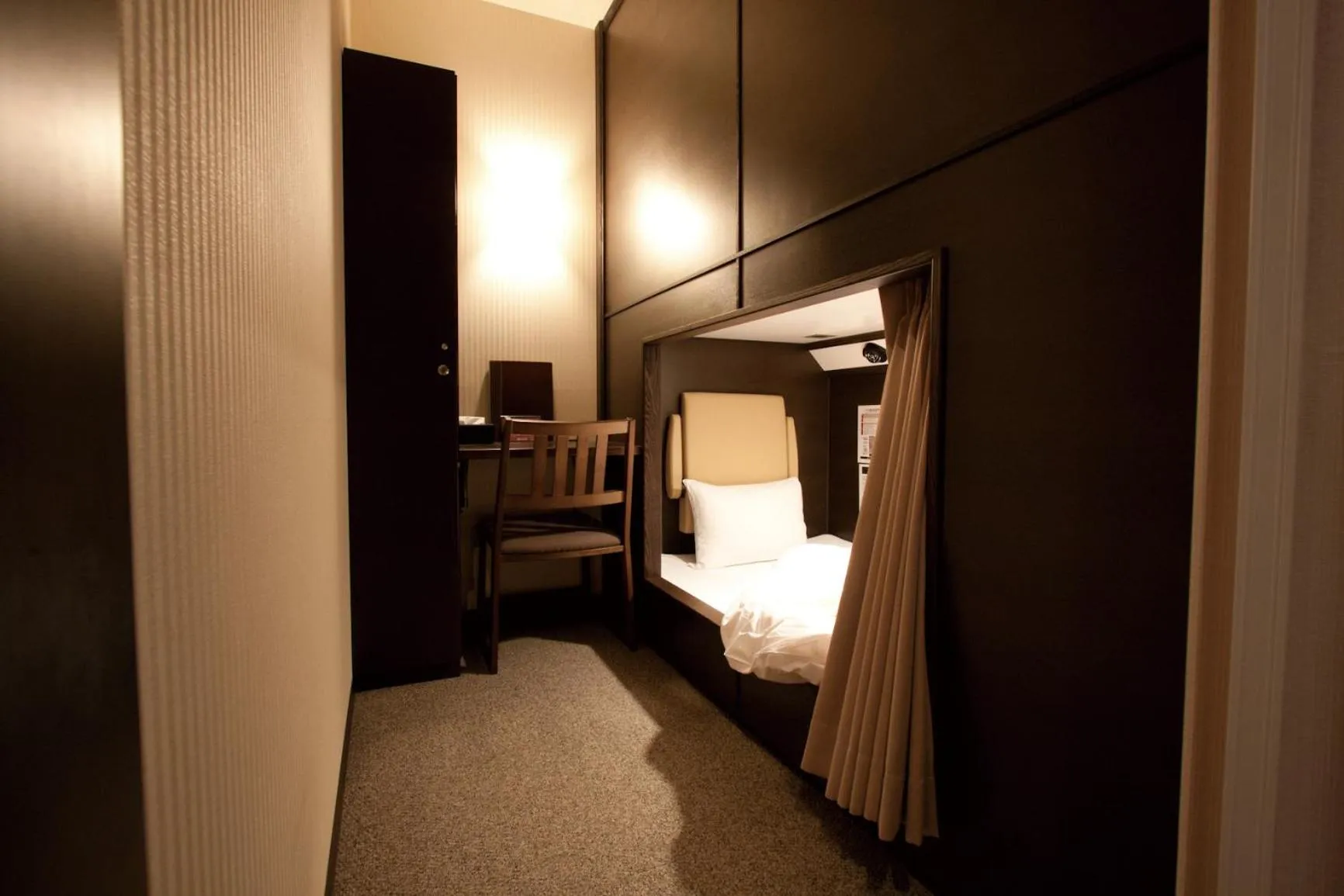 Bedroom, Bed in HEARTS Capsule Hotel & Spa Nakasu -Male only-