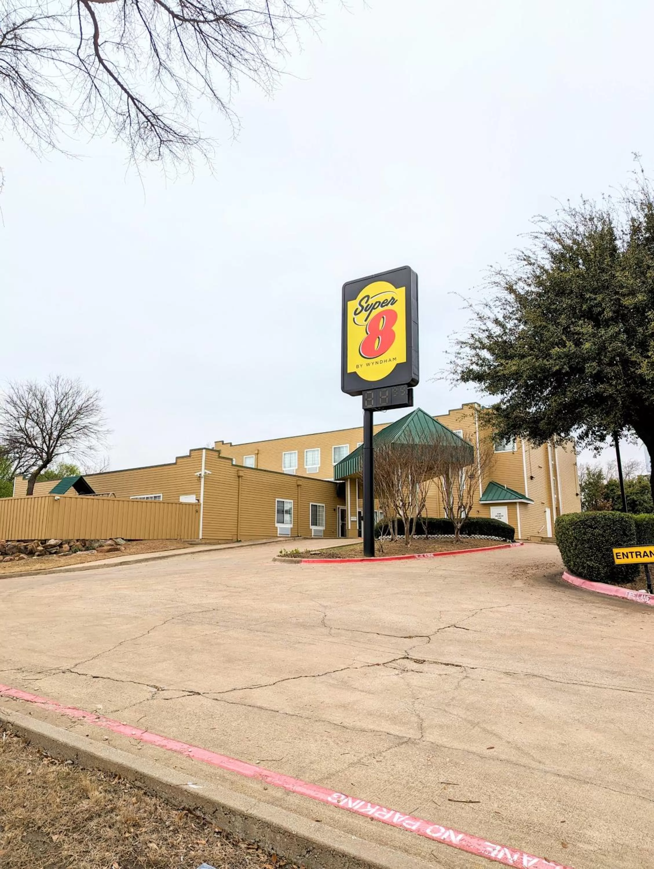 Property building in Super 8 by Wyndham Garland Rowlett East Dallas Area