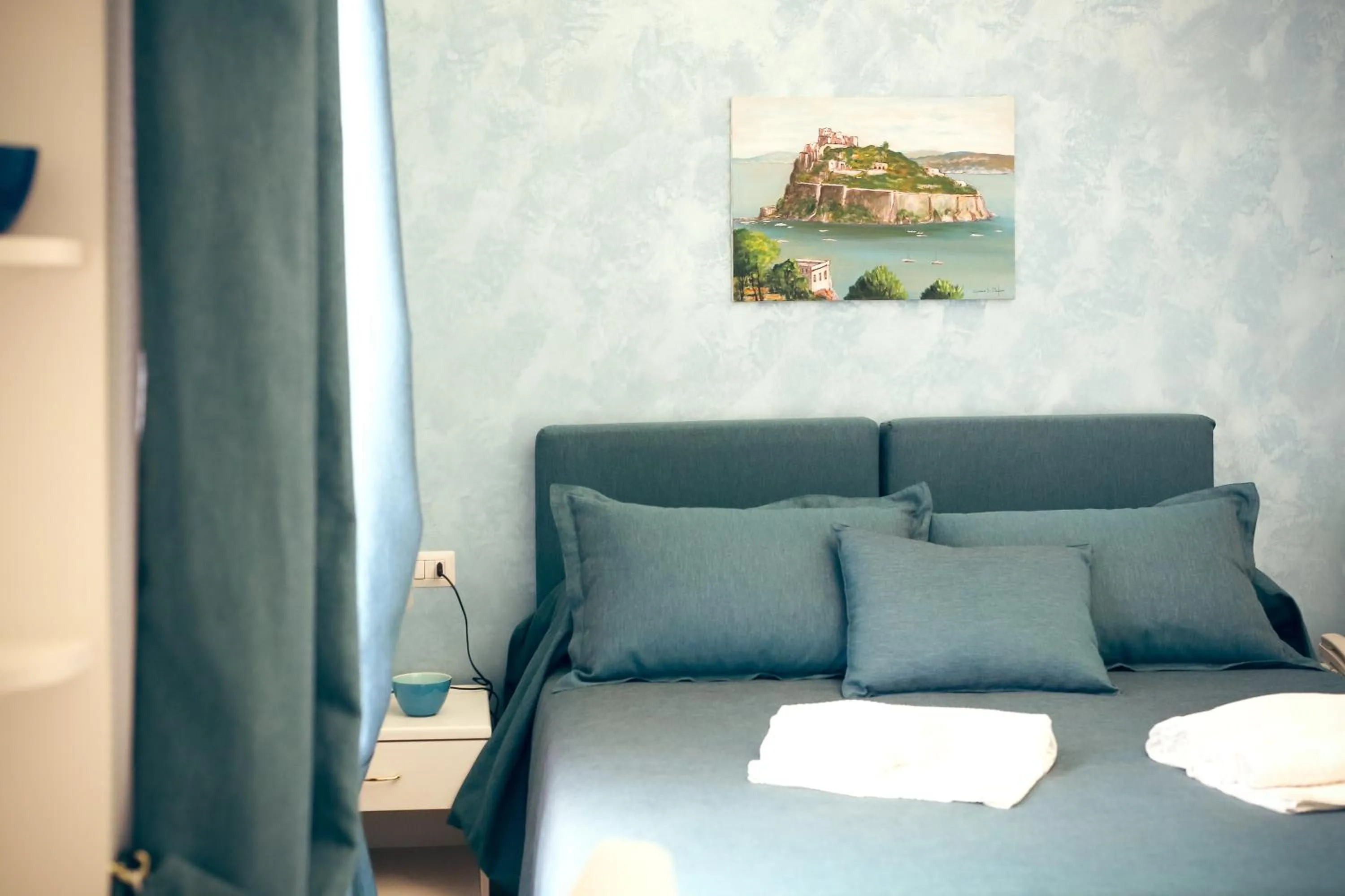 Bed in NapoliMia Boutique Hotel