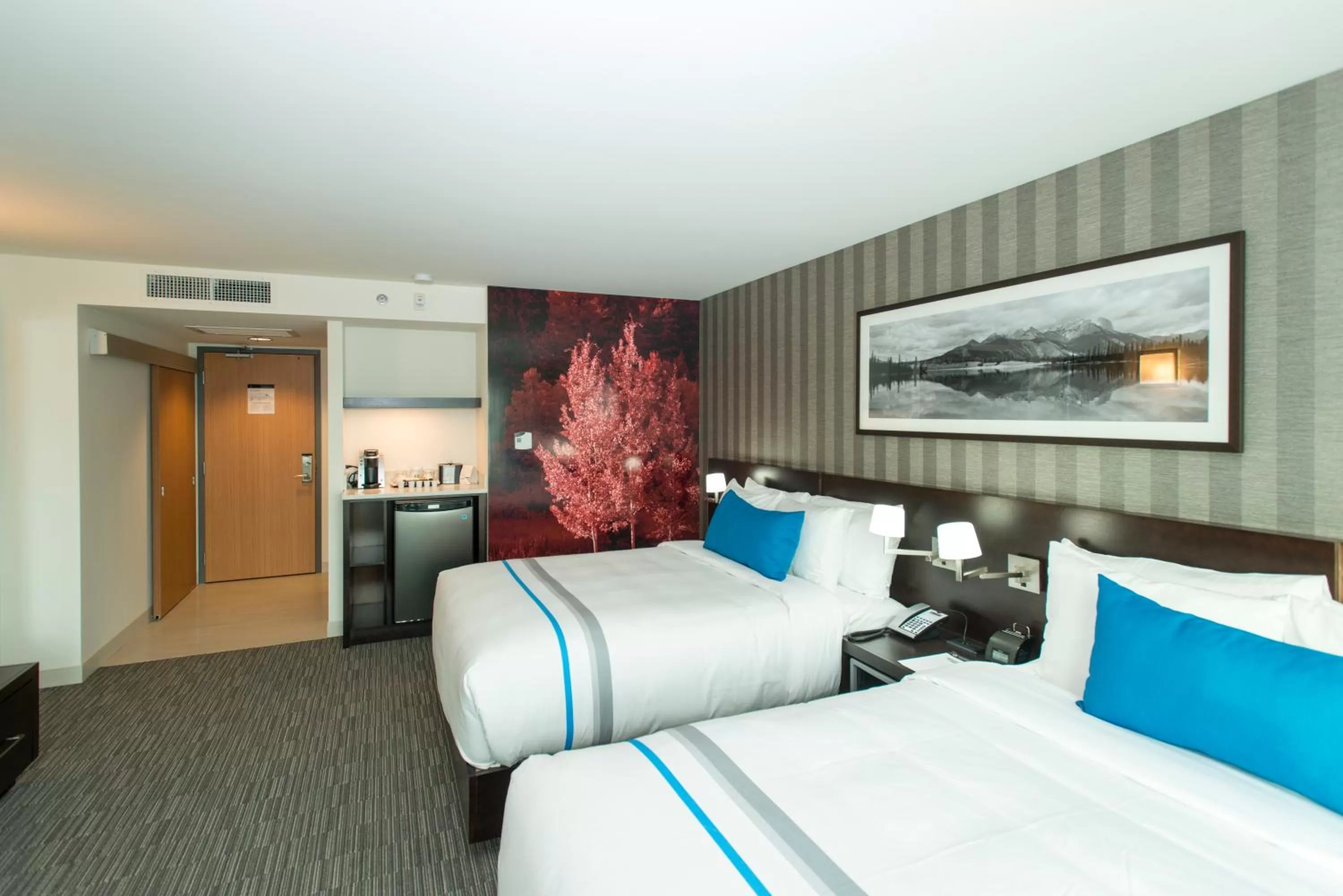 Bed in The Grand Winnipeg Airport Hotel by Lakeview