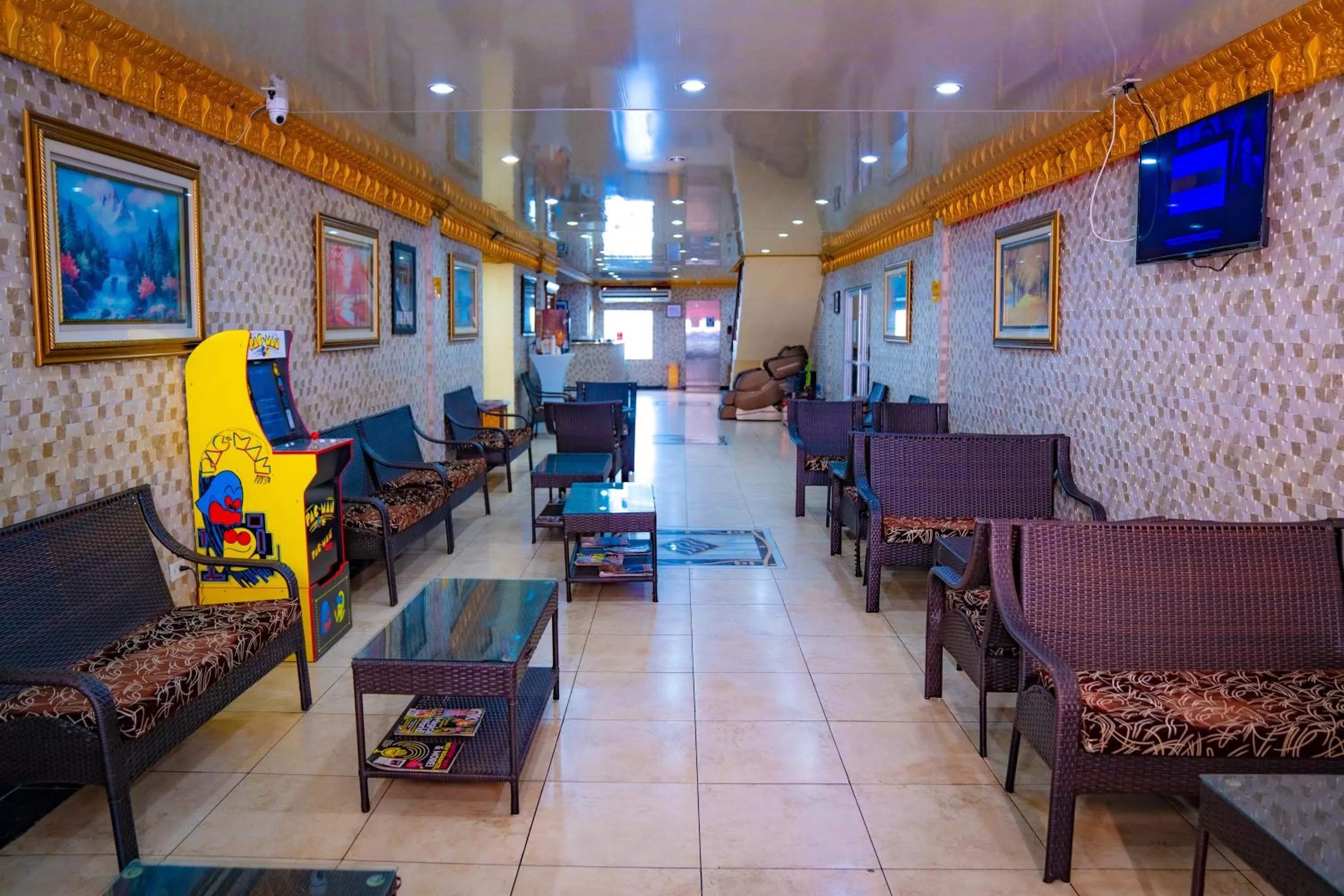 Communal lounge/ TV room in Metro Hotel Couva