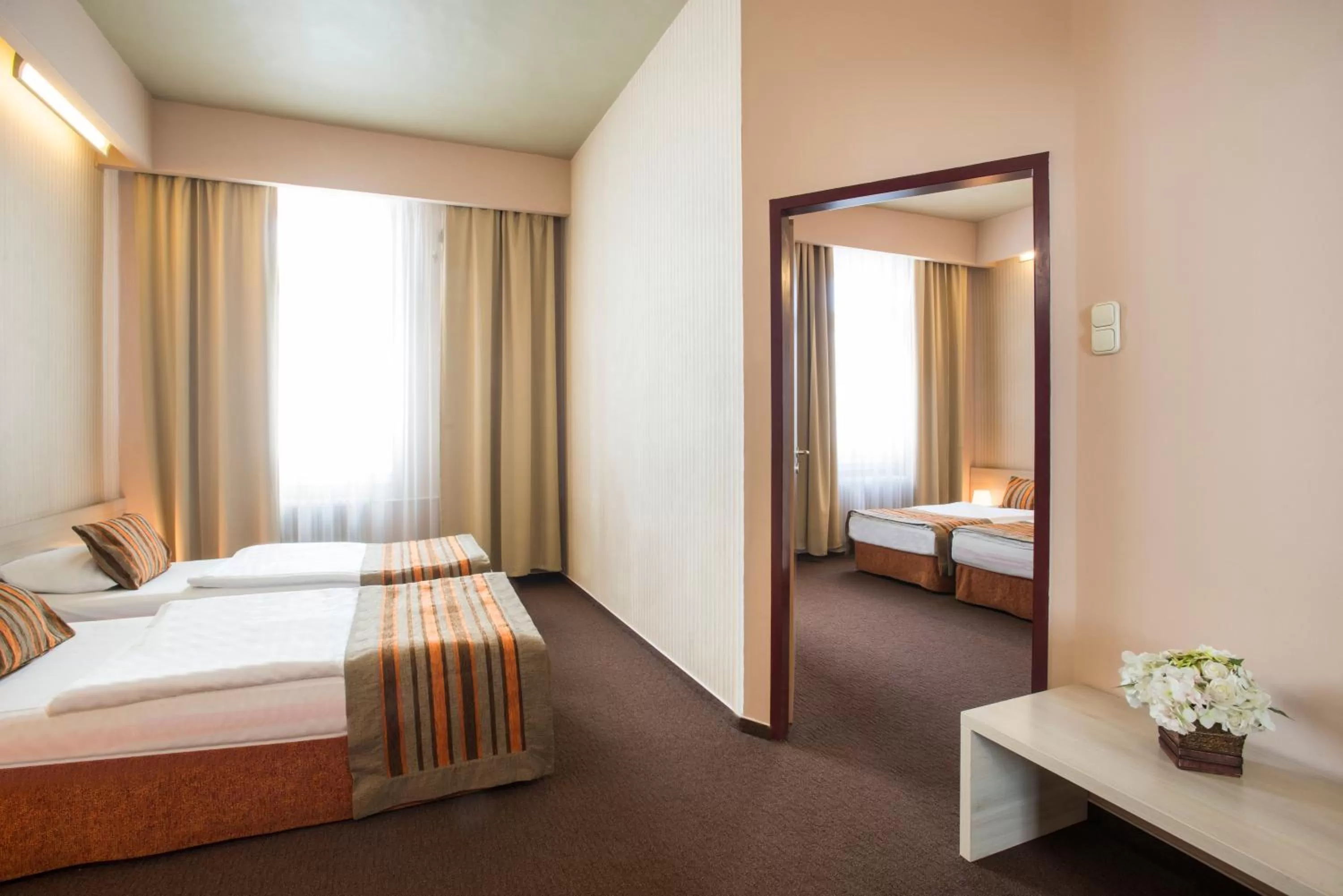 Bed in Star City Hotel