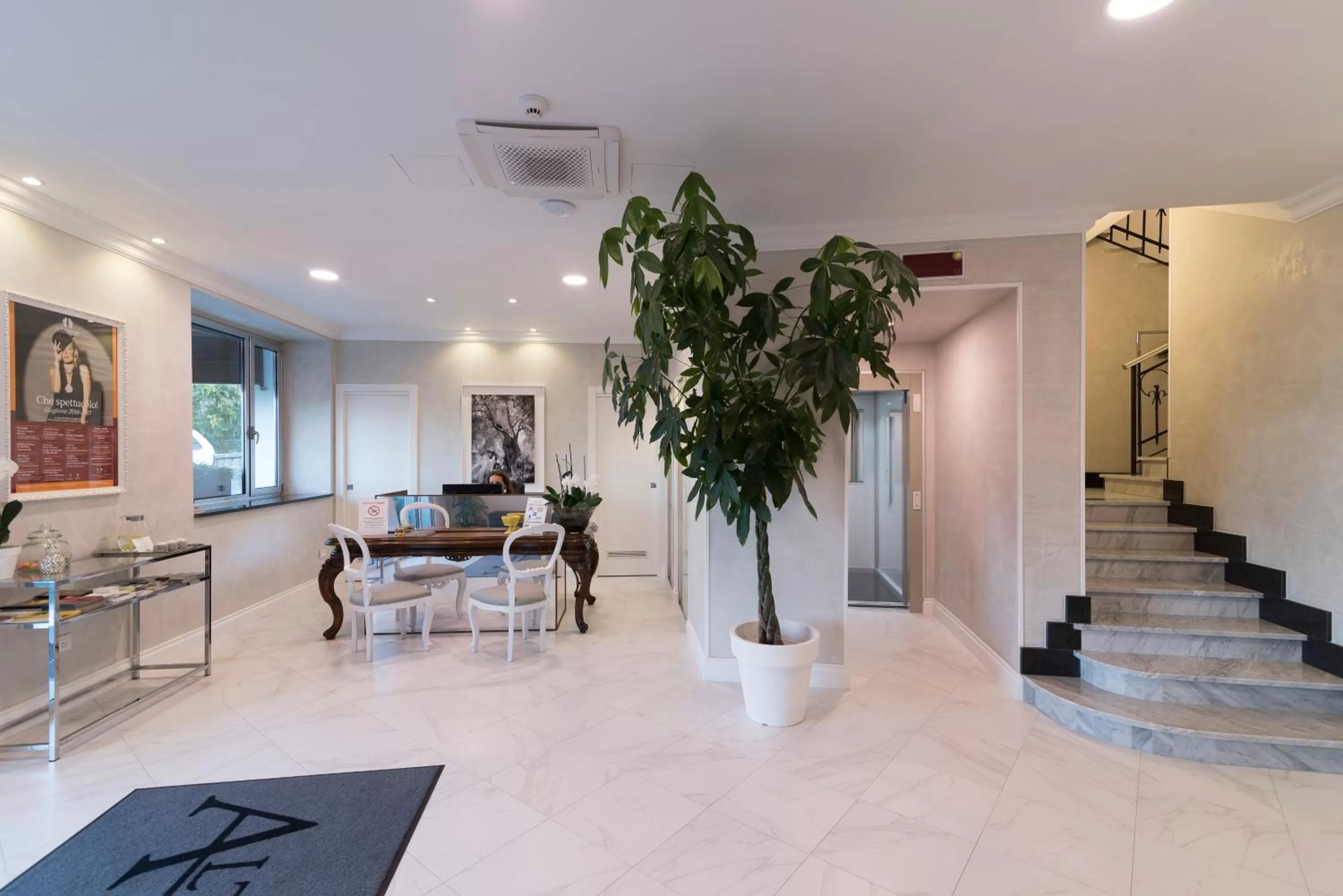 Lobby or reception in Altavilla Boutique Hotel