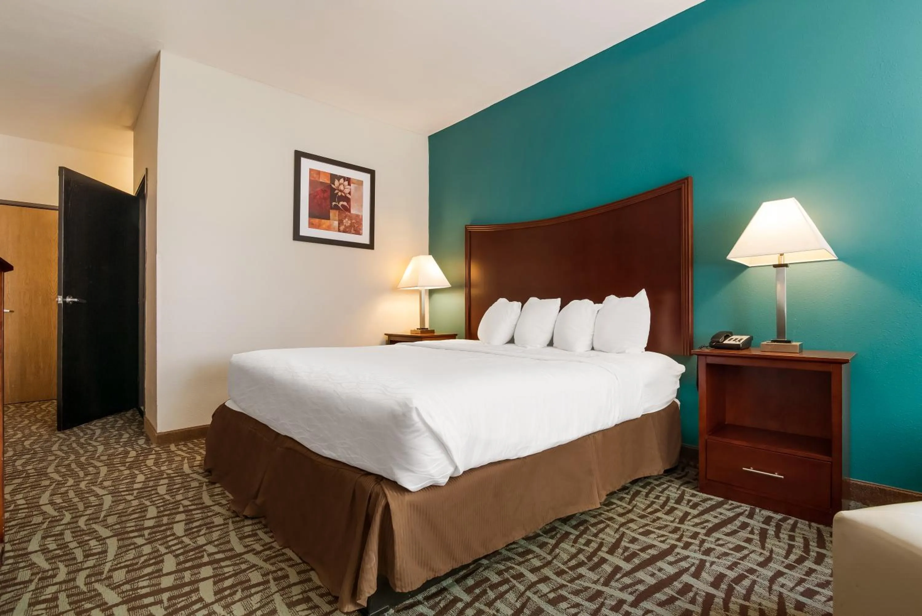 Bed in SureStay Plus Hotel by Best Western Topeka