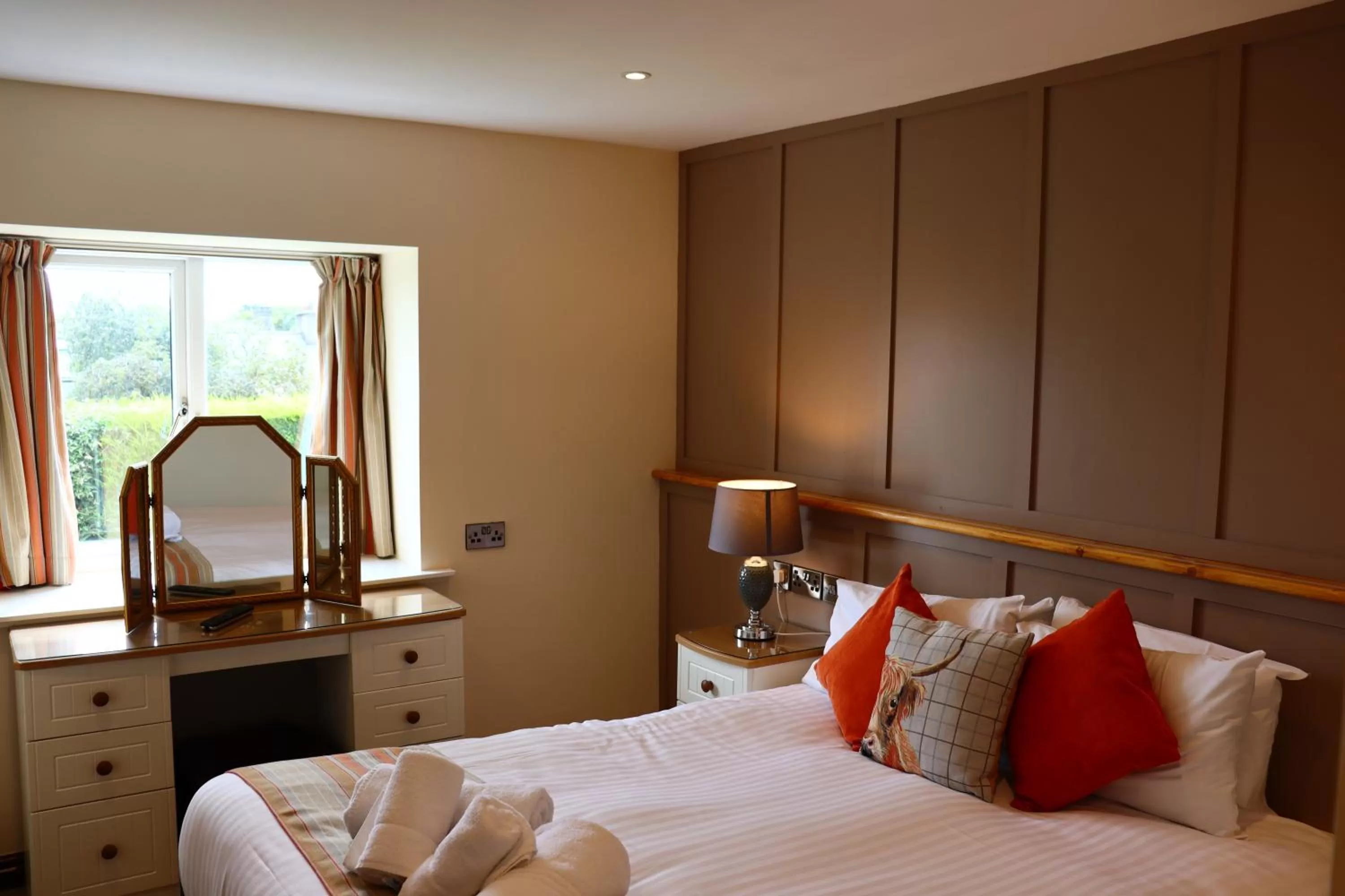 Bed in Lion Hotel & Studio Apartments