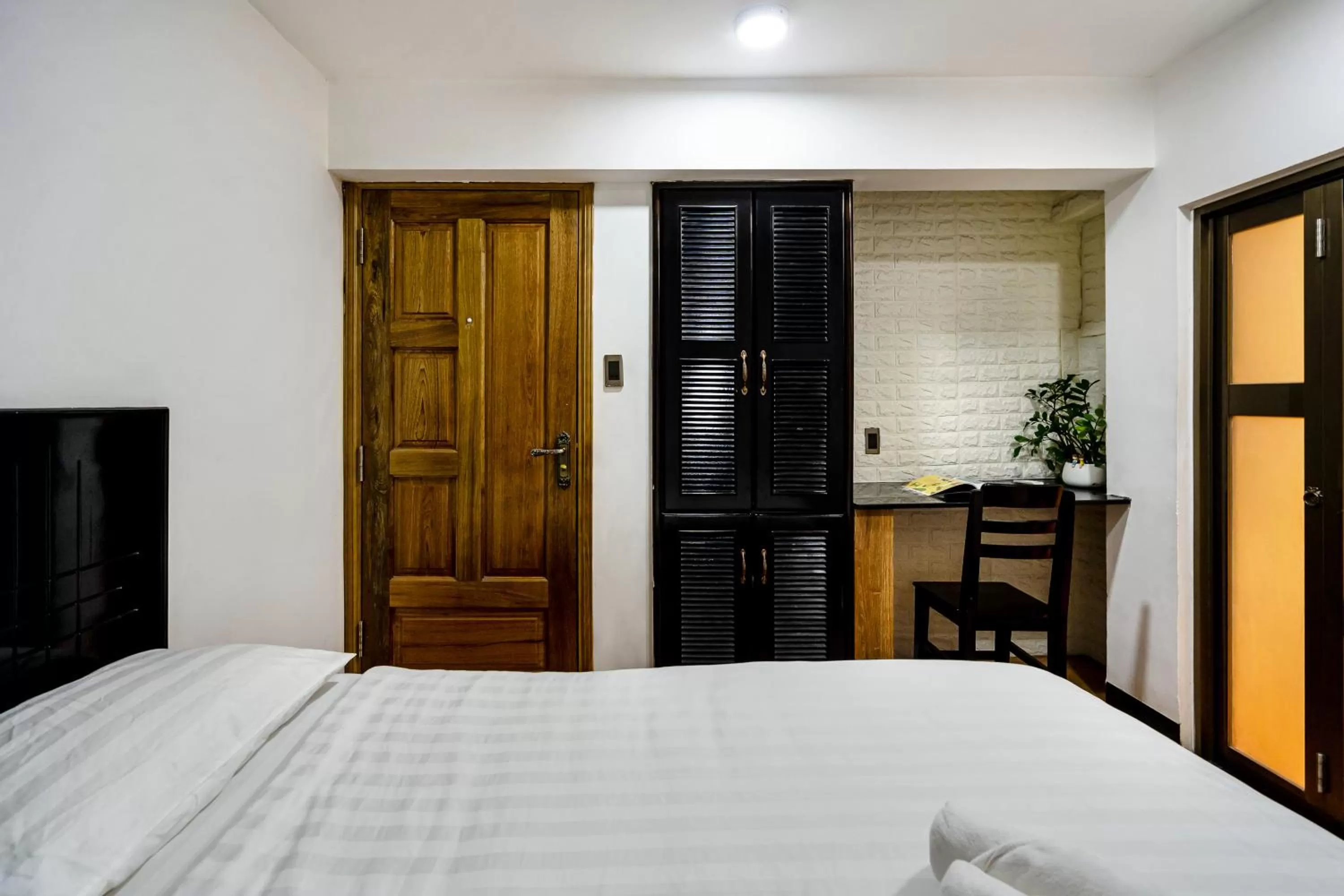 Bed in Lotus Laverne Hotel