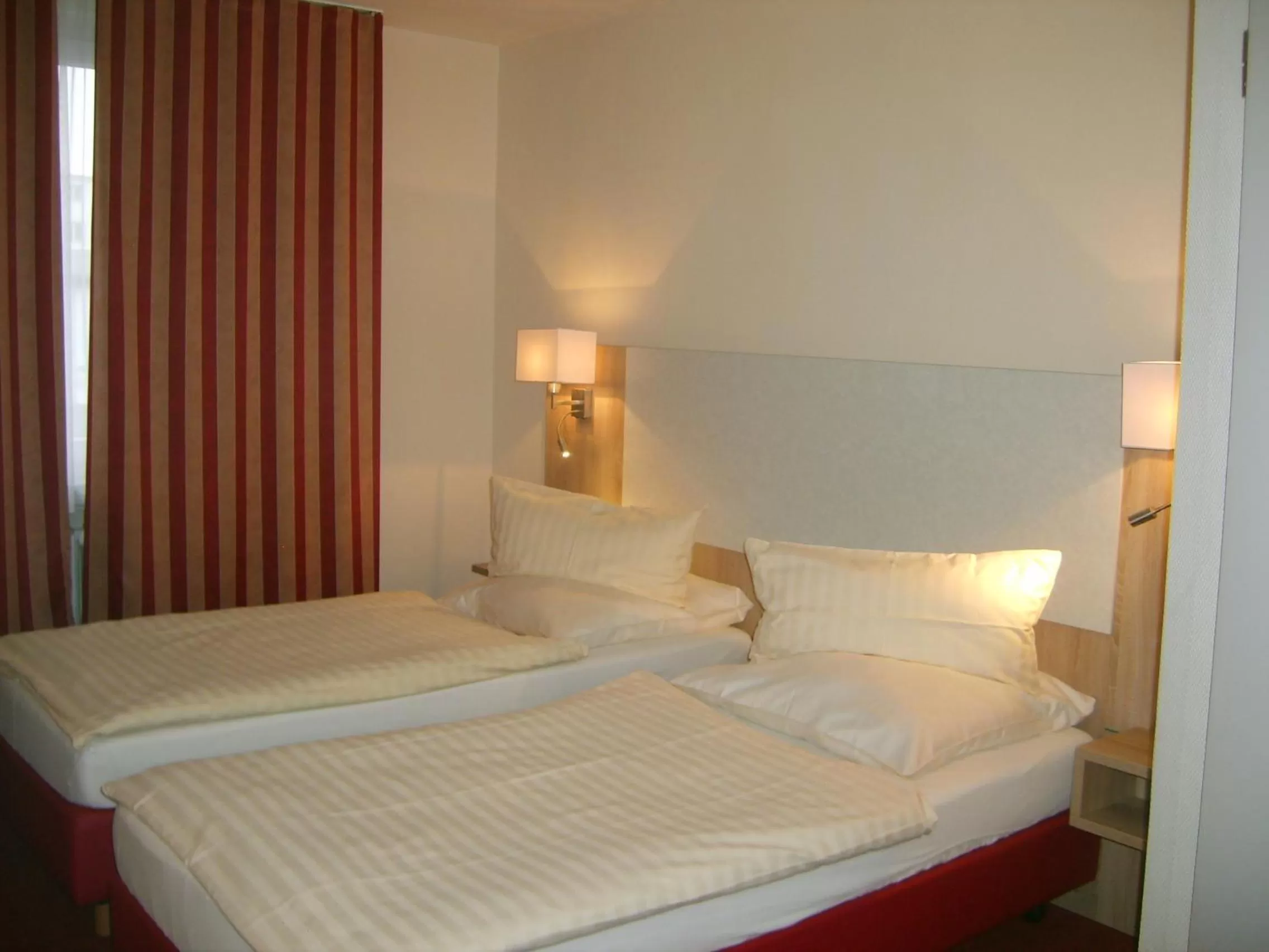 Bed in City Hotel by celina