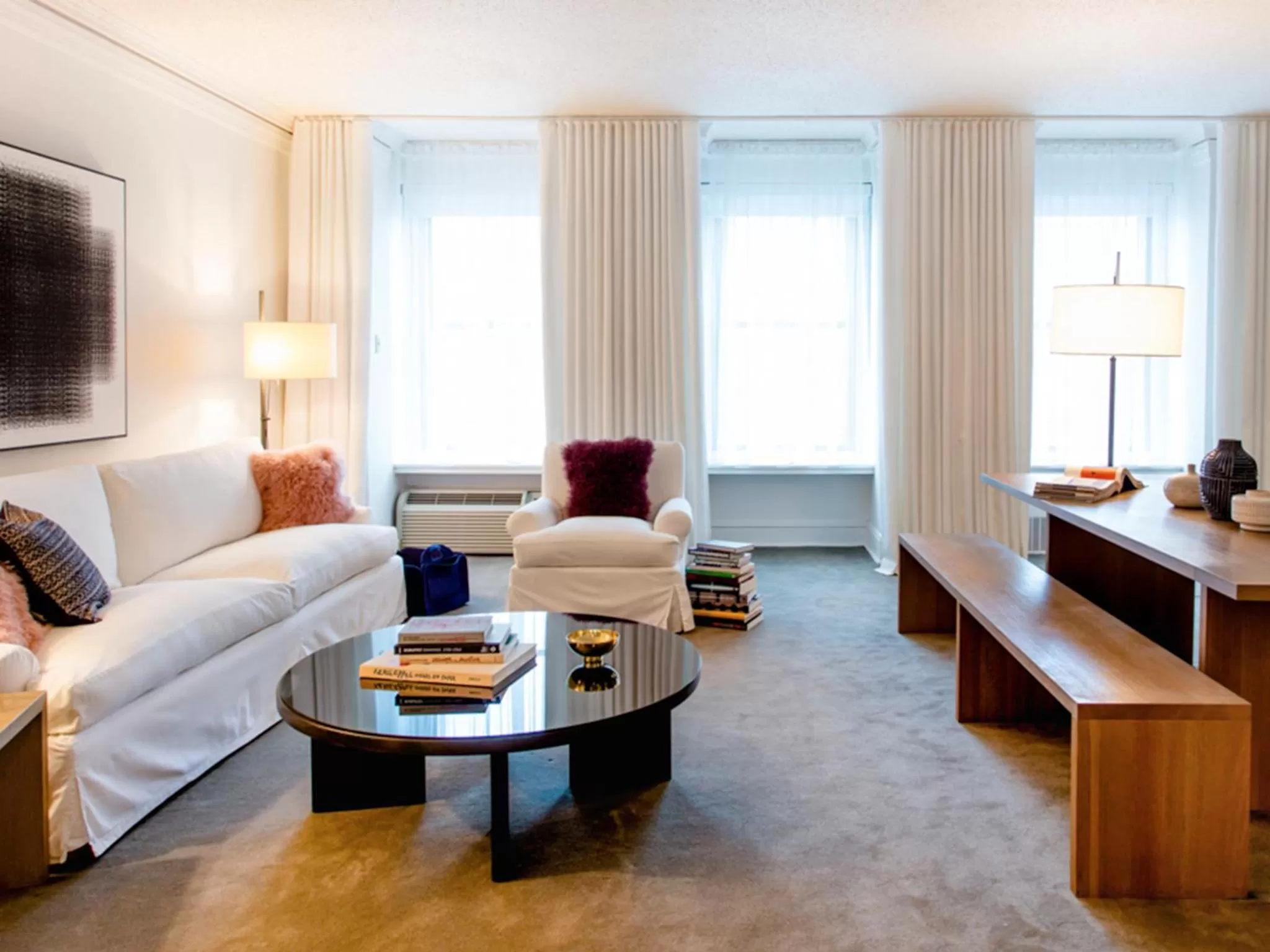 Living room in Ambassador Chicago, part of JdV by Hyatt