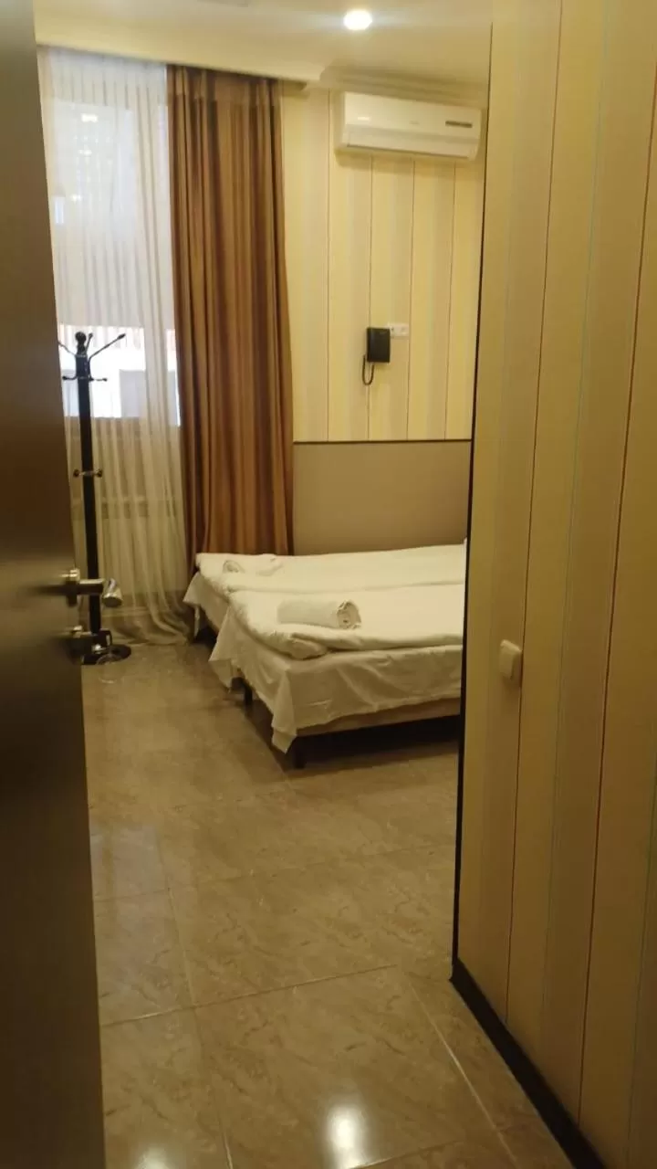 Bed in Eridana Hotel