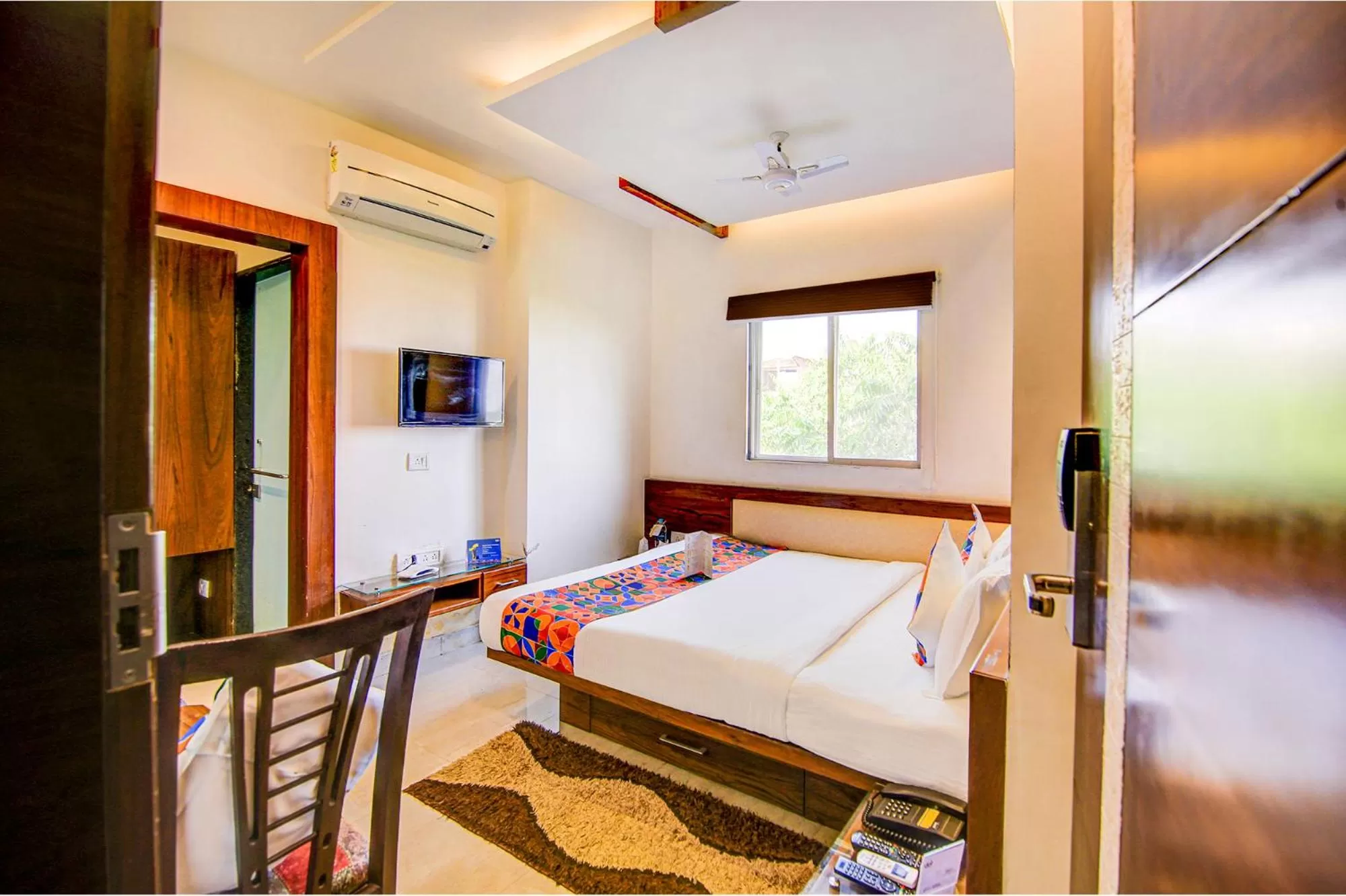 Bedroom in FabHotel The Khushi Regent