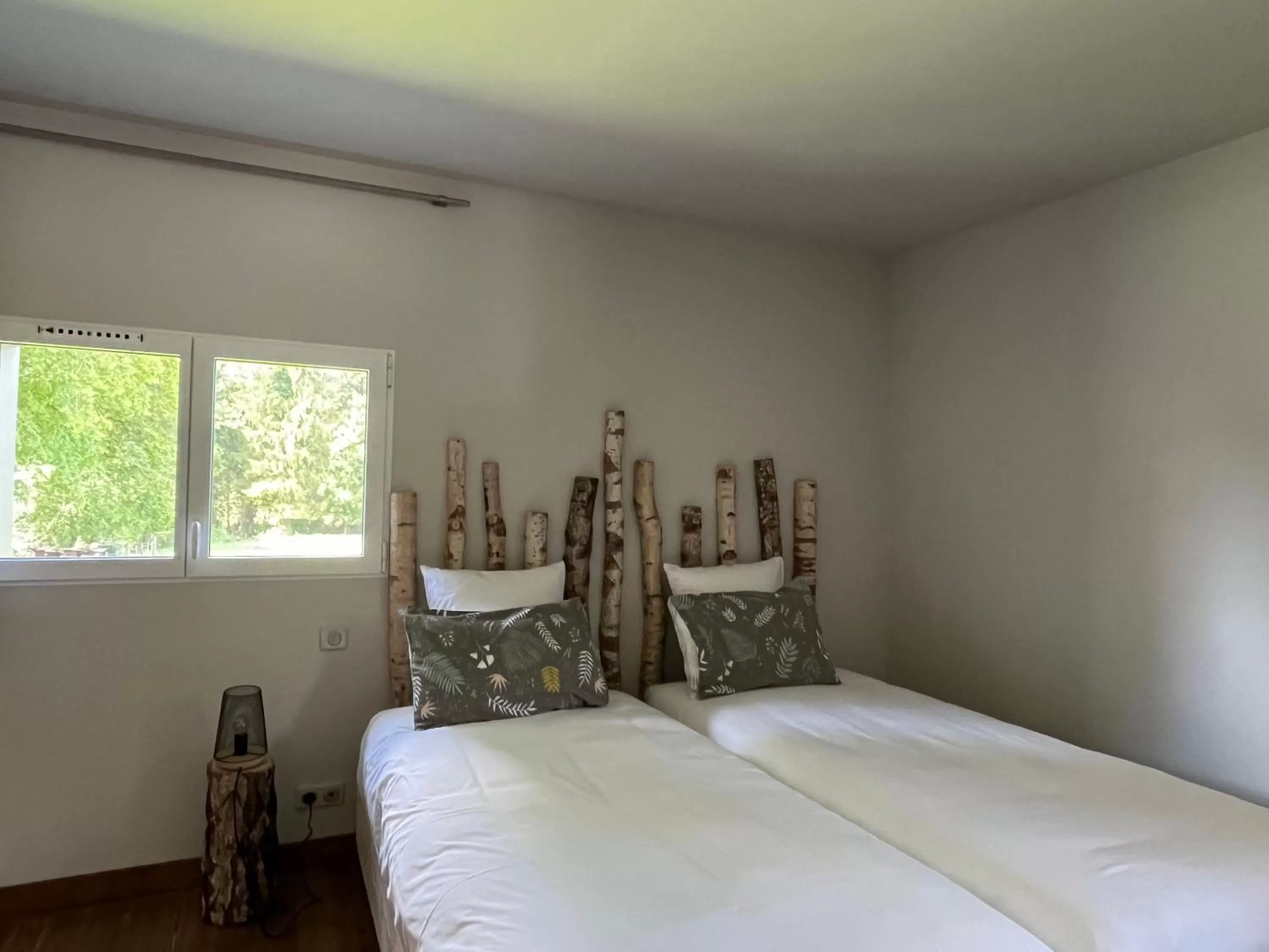 Bed in Hôtel En Tilleul