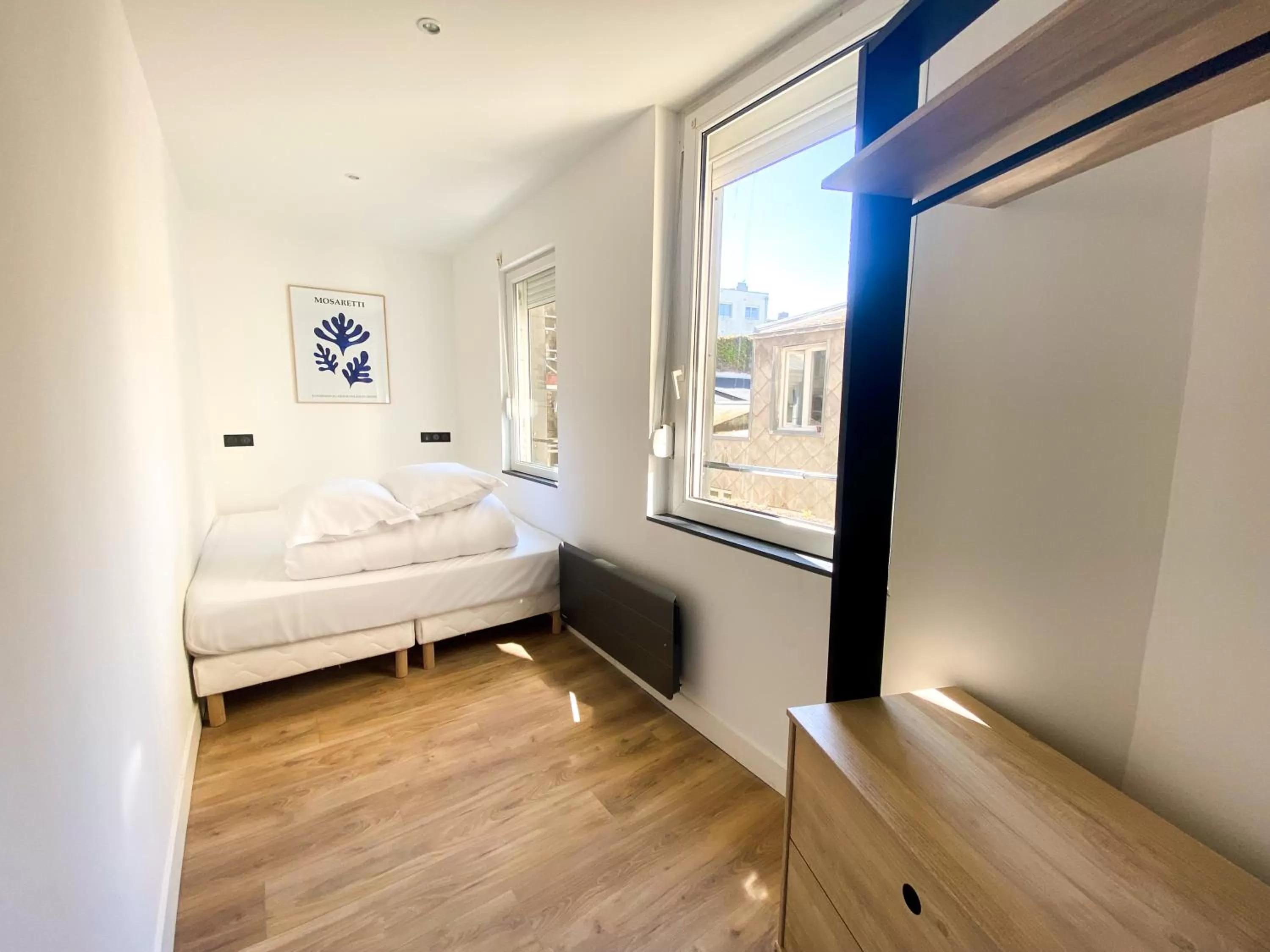 Bed in Le Bras d'or Apparts et Spa