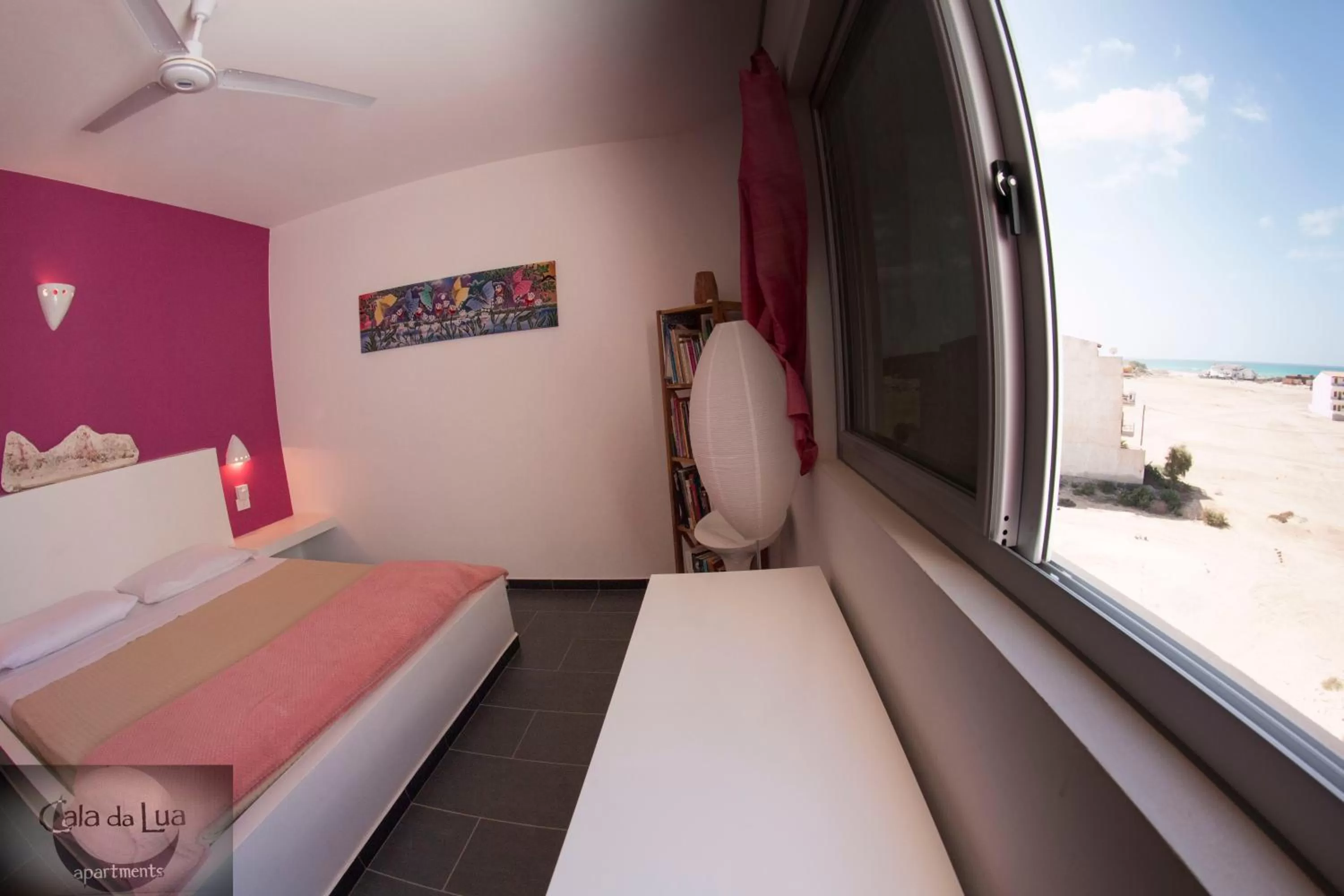 Photo of the whole room, Bed in Cala da Lua apartments
