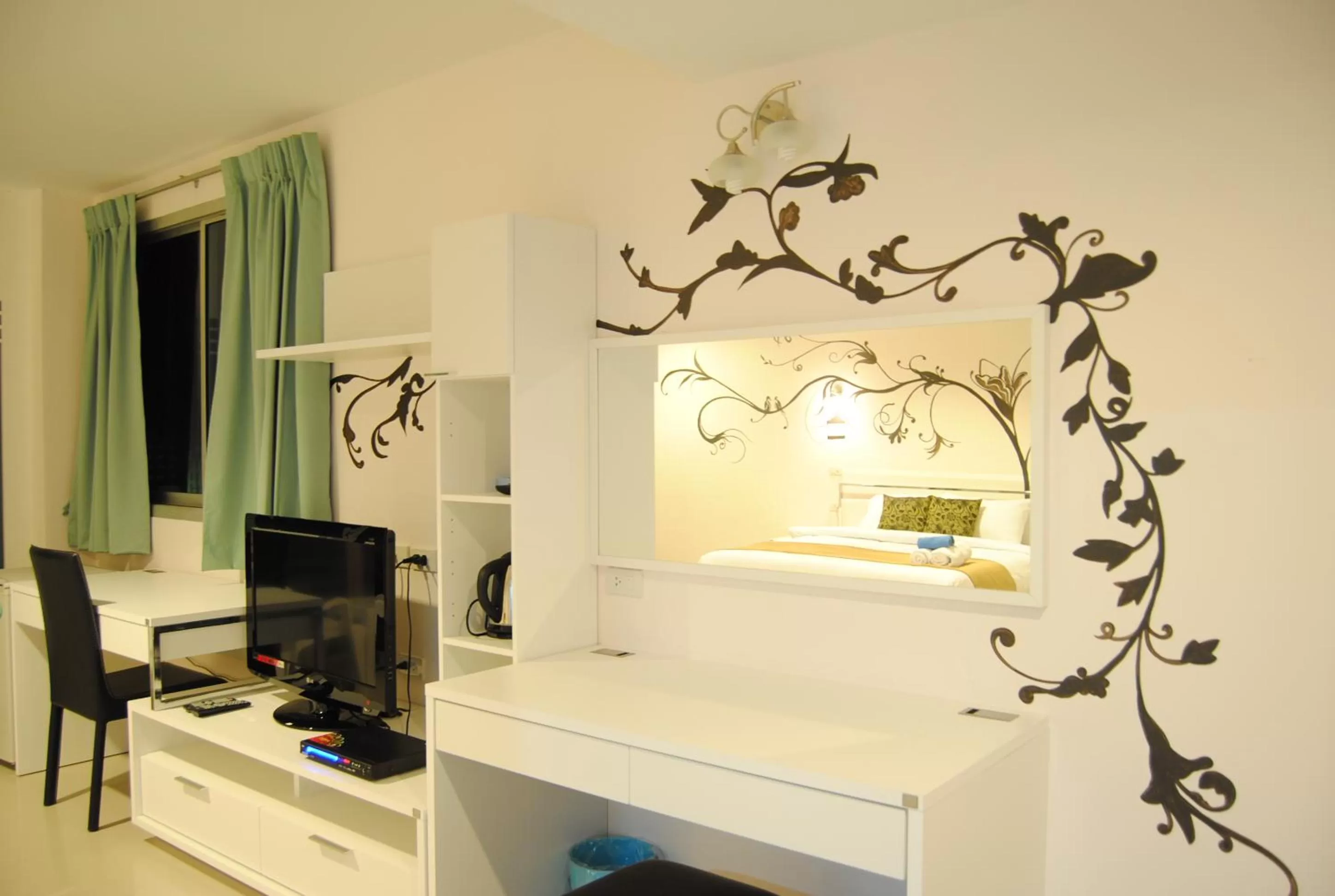 TV and multimedia in Baan Manthana Hotel, Hua Hin