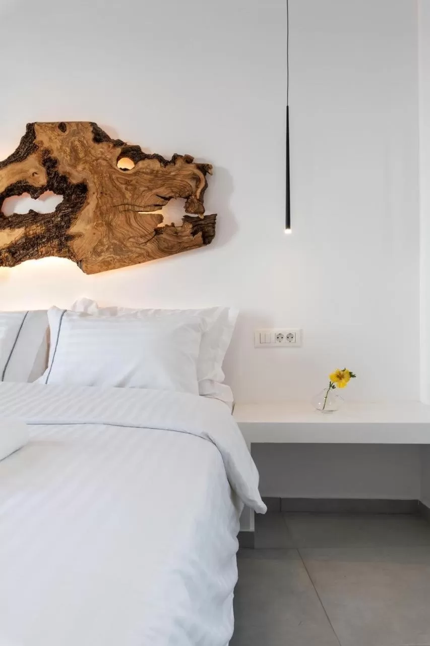 Bed in Sunset Paraportiani Rooms