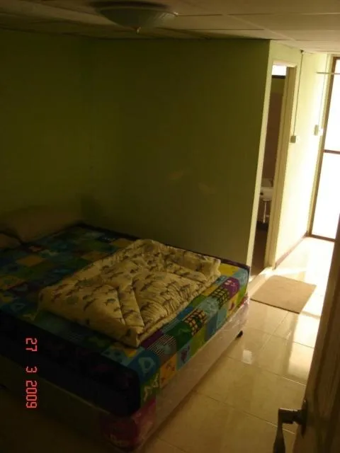 Bed in Kaset Guesthouse