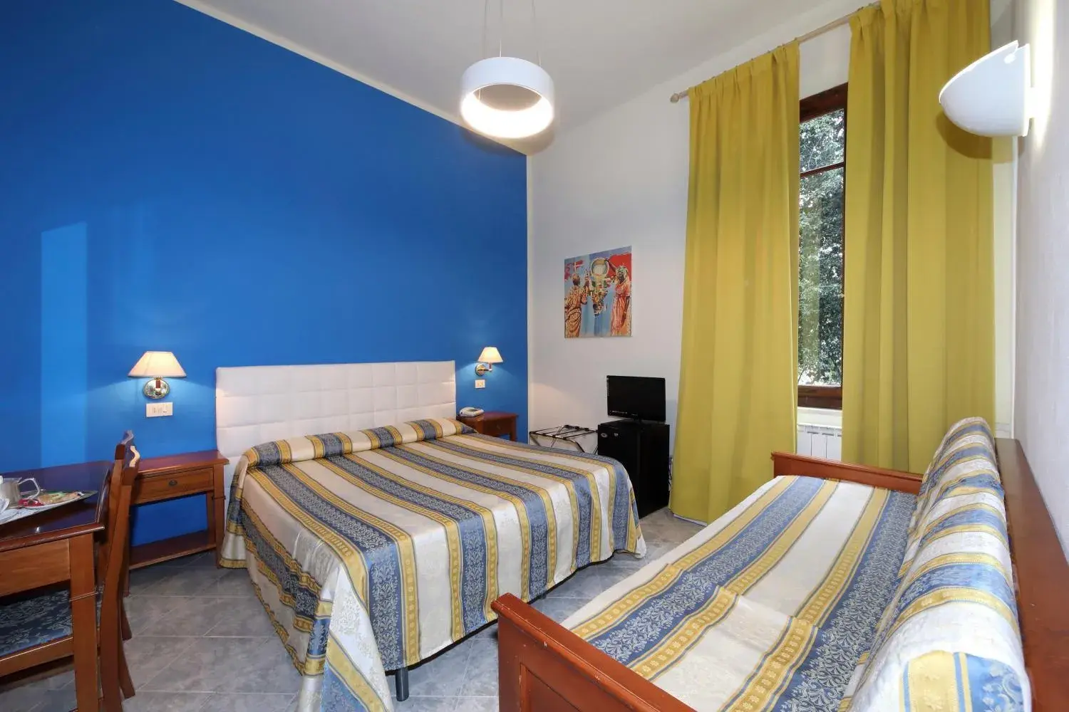 Quadruple Room in Hotel Moderno Quadruple Room in Hotel Moderno