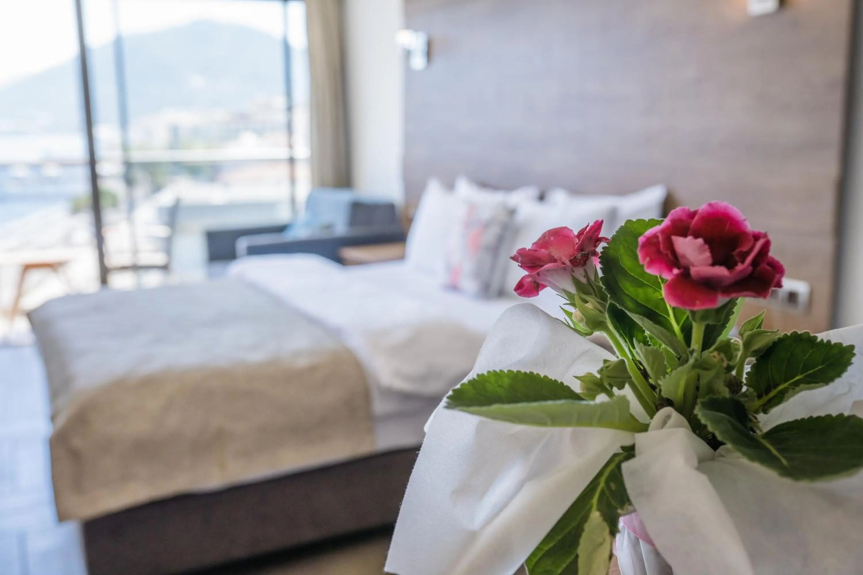 Bed in Aurasia Beach Hotel