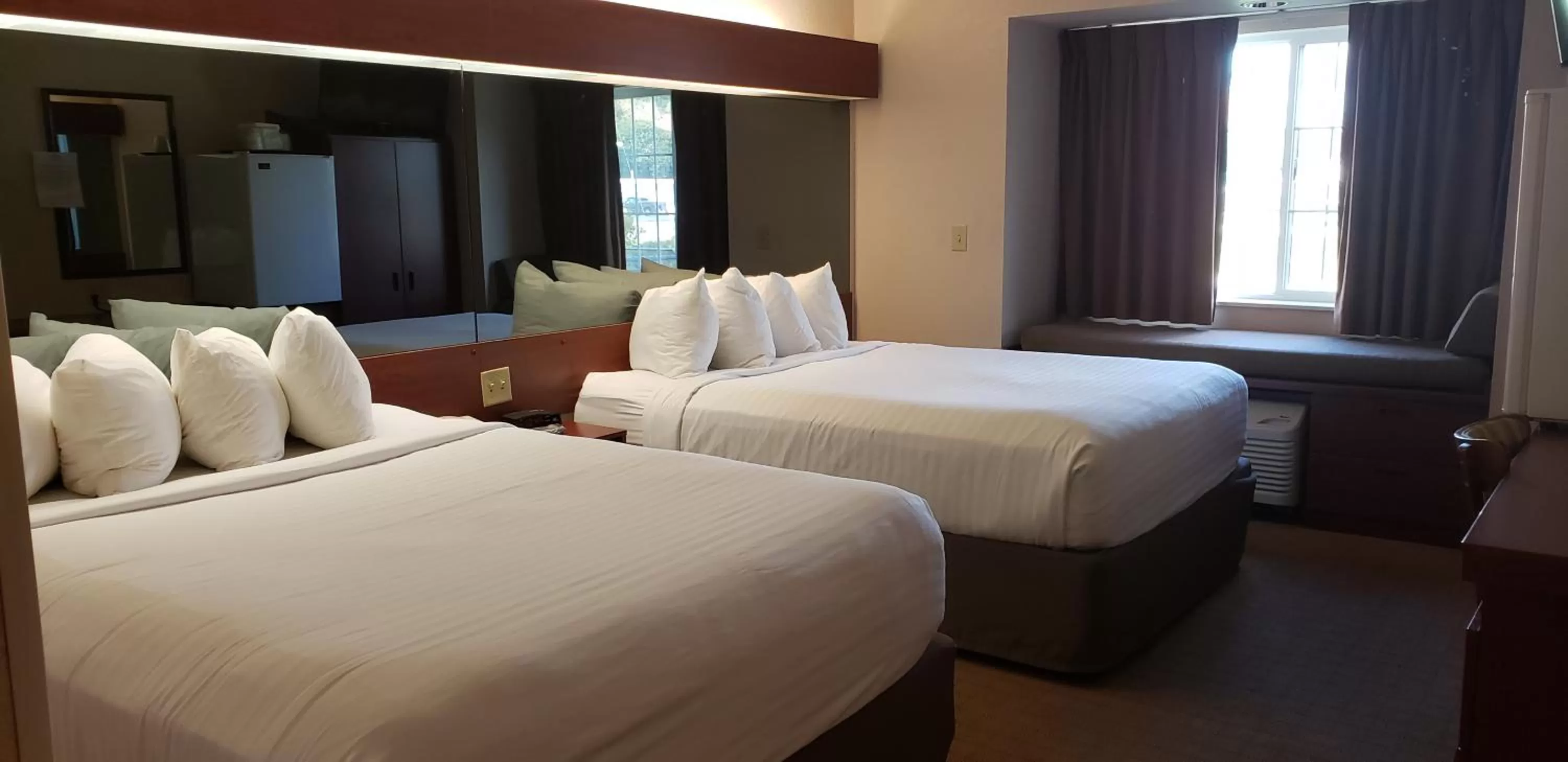 Queen Room with Two Queen Beds and Roll-In Shower - Mobility/Hearing Accessible - Non-Smoking in Microtel Inn & Suites by Wyndham Wellsville