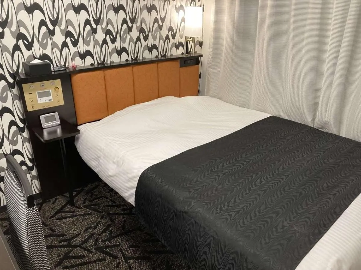 Bed in APA Hotel Beppu Ekimae