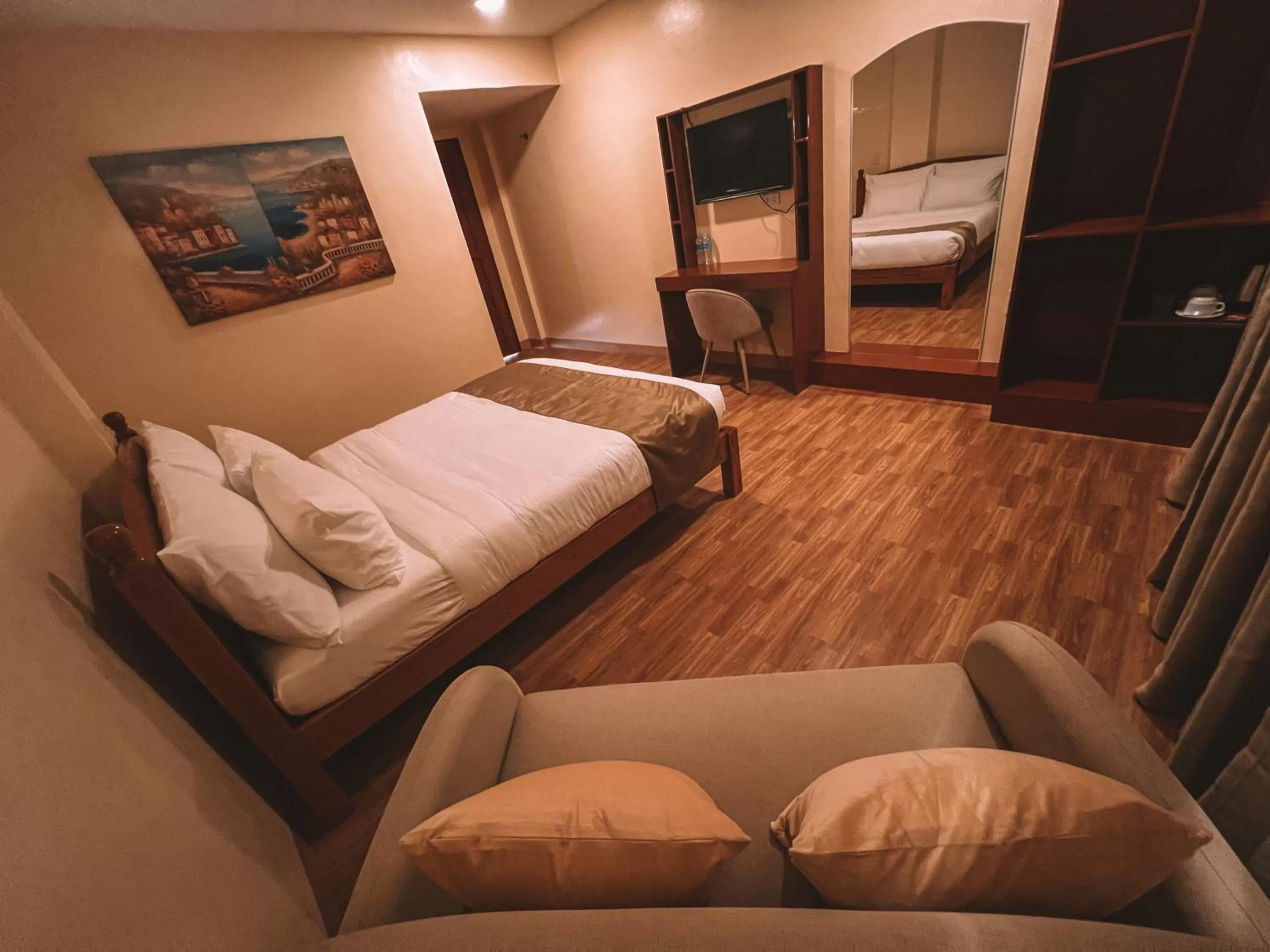 Bed in Rufana Suites