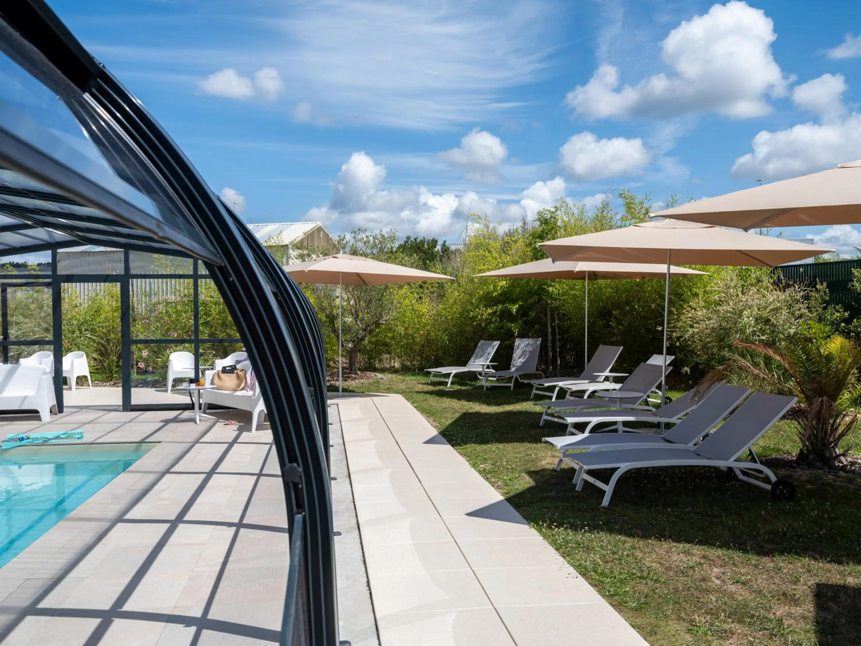 Swimming pool in Golden Tulip La Baule Hotel and Residence