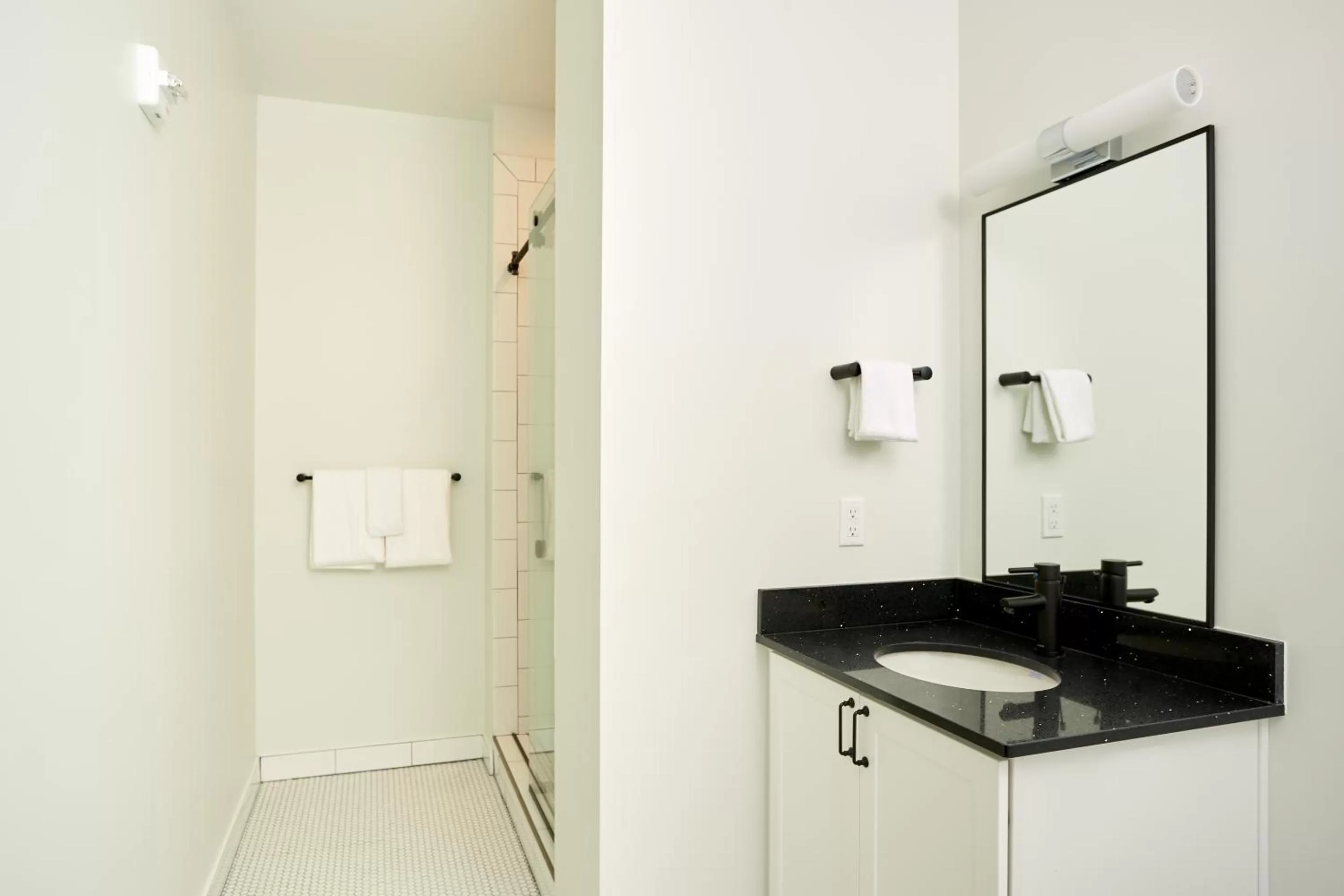 Living room, Bathroom in Sonder at The Promenade