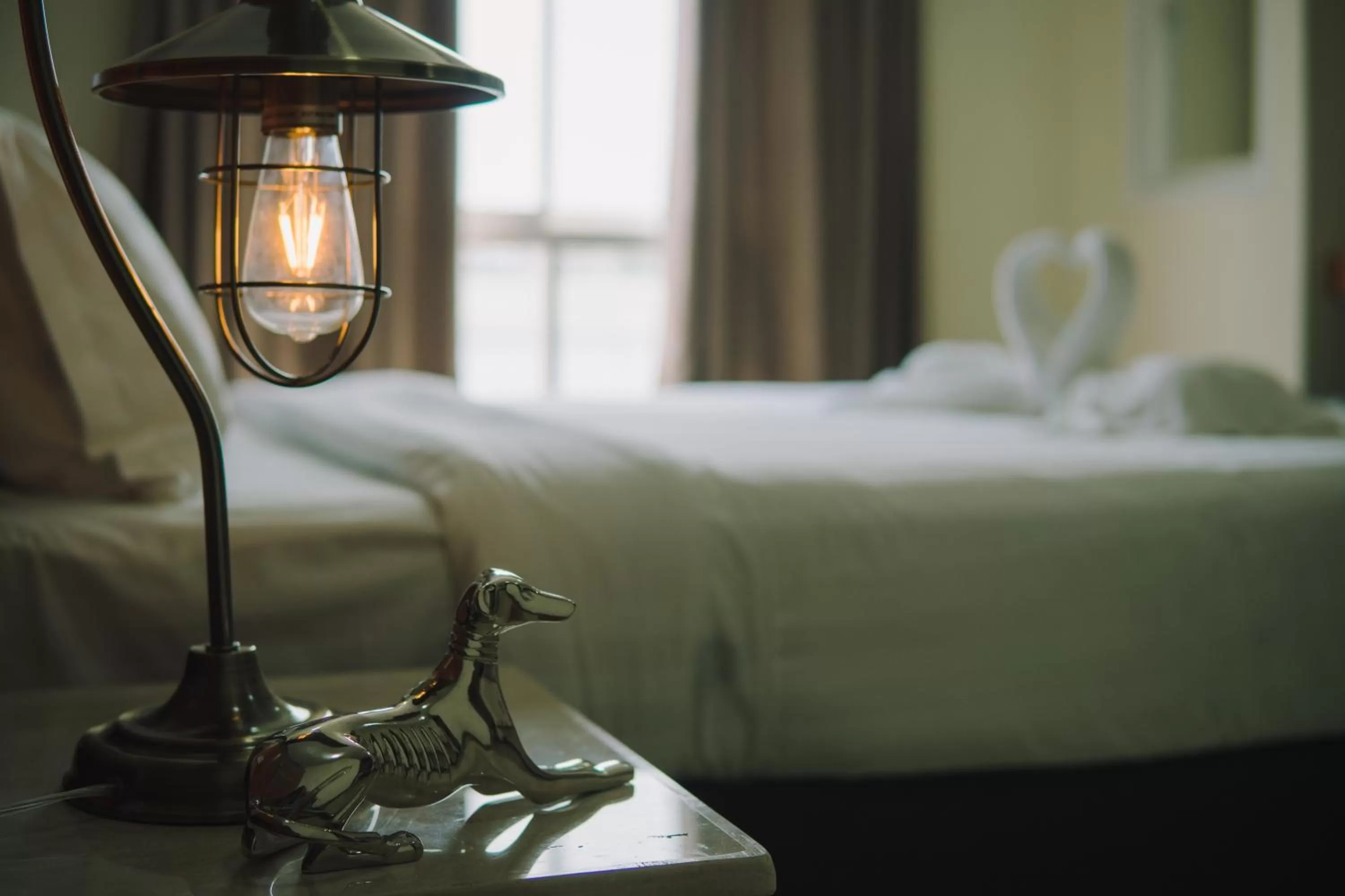 Bed in deVloft hotel Korat