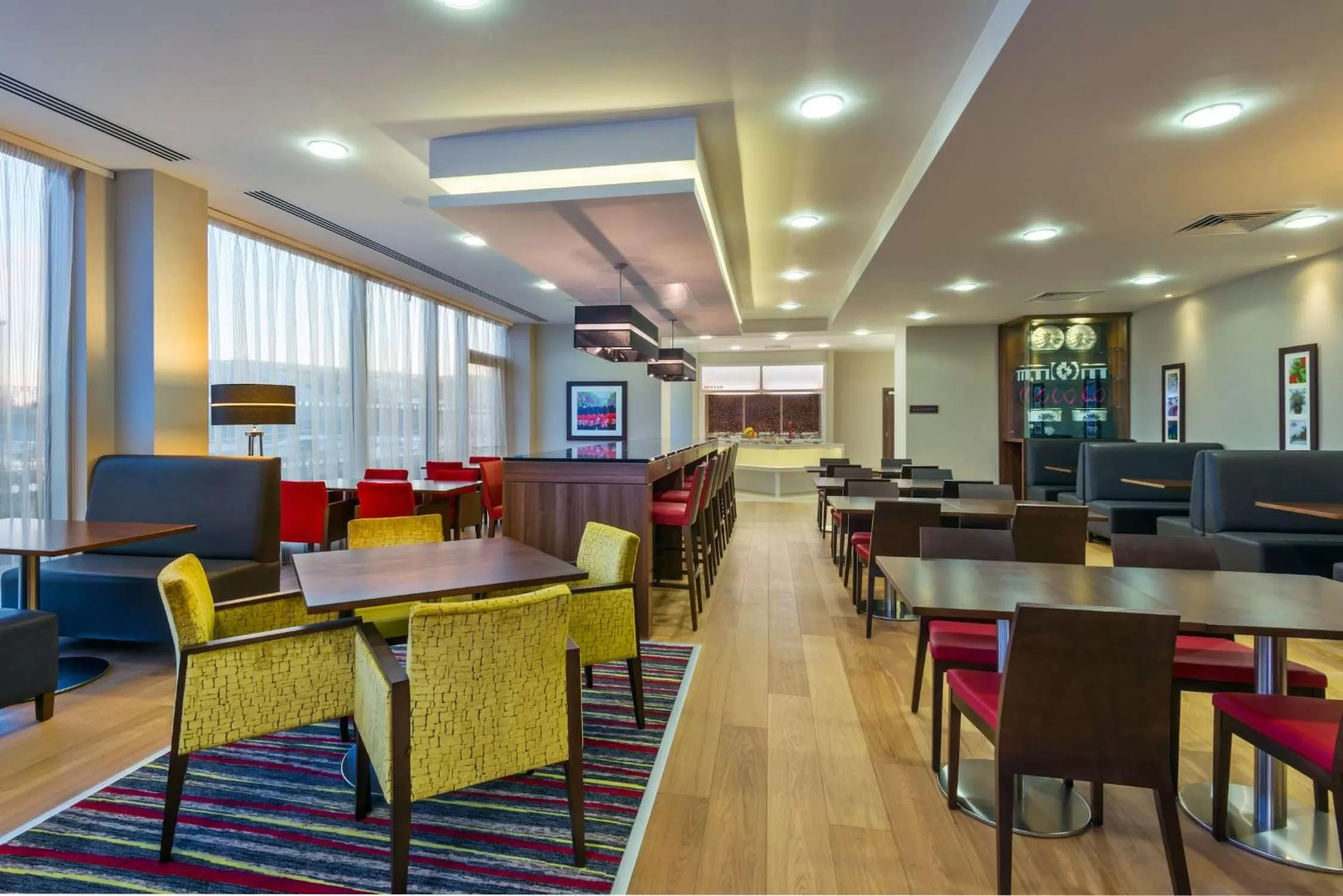 Dining area in Hampton by Hilton Luton Airport