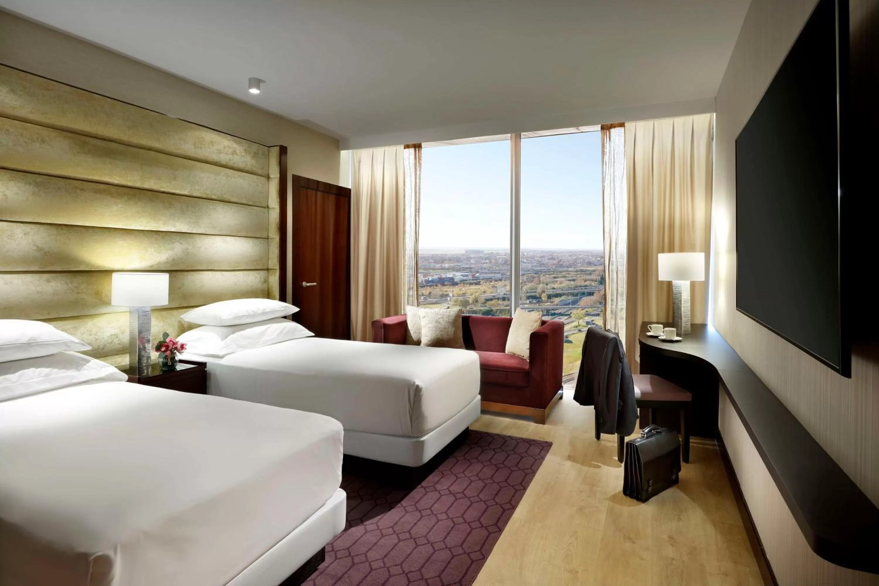 Photo of the whole room, Bed in Hyatt Regency Barcelona Tower