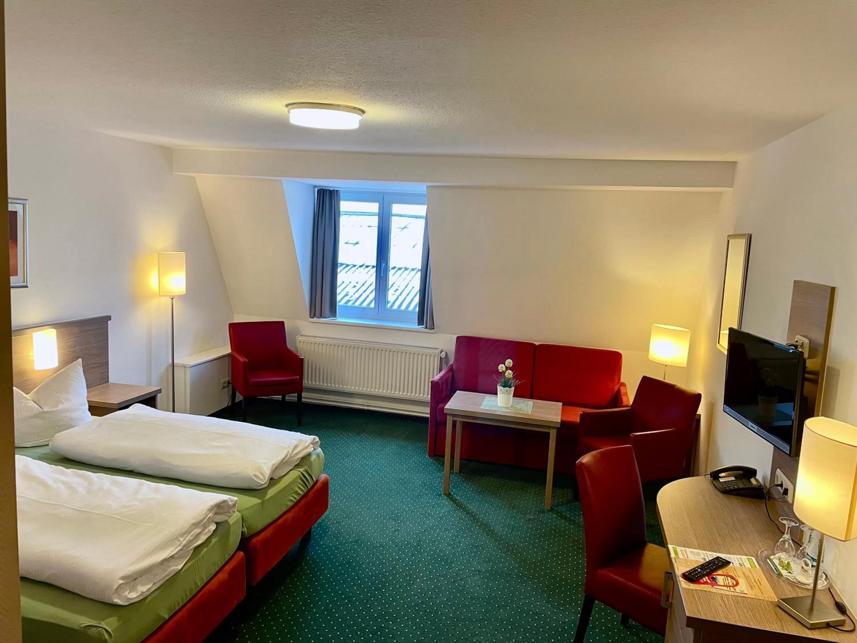 Photo of the whole room, Bed in Gasthof Scharfe Kurve